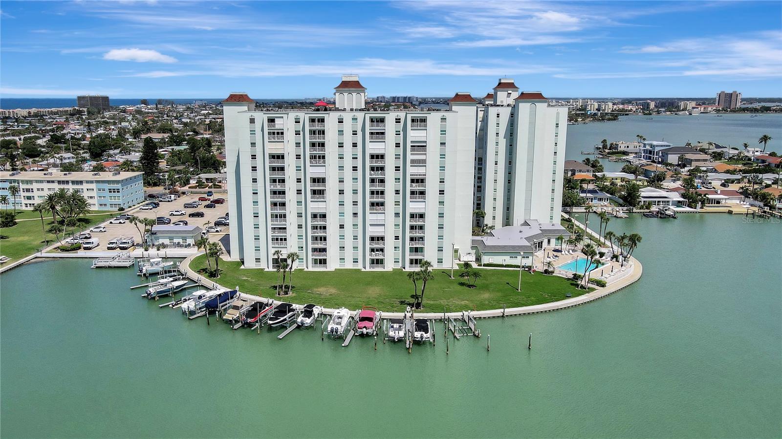 LOCATION! LOCATION! This Waterfront 2-Bedroom, 2-Bath Condo at 400 64th Ave, St. Pete Beach is Priced to Sell!  Enjoy stunning water views from the primary bedroom. Step into a space where elegance meets effortless living. The current owner has spared no expense in upgrading this property, featuring a stunning cotemporary kitchen, beautifully refreshed bathrooms, and stylish new fixtures and updates throughout,  This is true turn-key living and move in ready.   This beautifully updated 2-bedroom, 2-bath condo located in the heart of St. Pete Beach and walkable to everything. Recently renovated throughout, this home blends modern comfort with coastal charm. Bright and airy living spaces create a perfect setting for relaxation or entertaining. Step outside to take in serene water vistas and gentle ocean breezes. Ideal for year-round living or a vacation retreat, this condo offers the ultimate blend of style and location. Own a condo with RESORTY STYLE amenities and still be able to go up one flight of stairs to you private condo.  Don’t miss your chance to own a slice of paradise on St. Pete Beach!