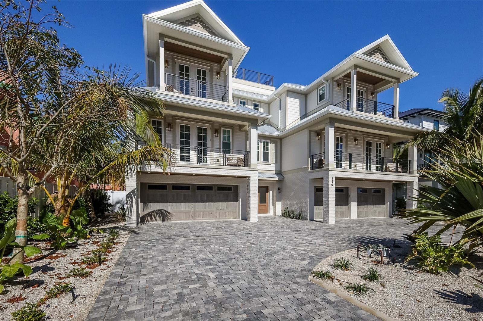 Coastal luxury meets exceptional investment opportunity on Lido Key. Just steps from the white sands and turquoise waters of Lido Beach, this custom one of a kind residence offers 10 bedrooms, 10 full baths, and 2 half baths in a beautifully designed turnkey furnished setting.
Built with a sophisticated contemporary aesthetic, the home features an open concept floor plan spanning multiple living levels, designed for both effortless entertaining and comfortable everyday living. The chef’s kitchen is a true centerpiece, complete with a large quartz island, walk in pantry, panel ready refrigerator, premium appliances, and custom lighting.
Each of the 10 bedrooms includes its own ensuite bath, creating a private and luxurious experience for guests and making the home ideal for large gatherings or vacation rental use. Thoughtful design elements, including unique accent walls and upscale finishes, add character and cohesion throughout.
Outdoor living is equally impressive, with multiple balconies, an expansive patio, and a private pool and spa that create a true resort-style atmosphere. The upper level offers an additional entertaining space with a wet bar, while the rooftop terrace delivers stunning views and the perfect setting to relax or host guests.
An elevator services the home for added convenience, and the spacious primary suite provides a serene retreat with a double vanity, walk-in shower, and a freestanding soaking tub.
Located just minutes from St. Armands Circle and a short drive to downtown Sarasota’s dining, shopping, and cultural attractions, this property offers the best of coastal living with strong income potential.