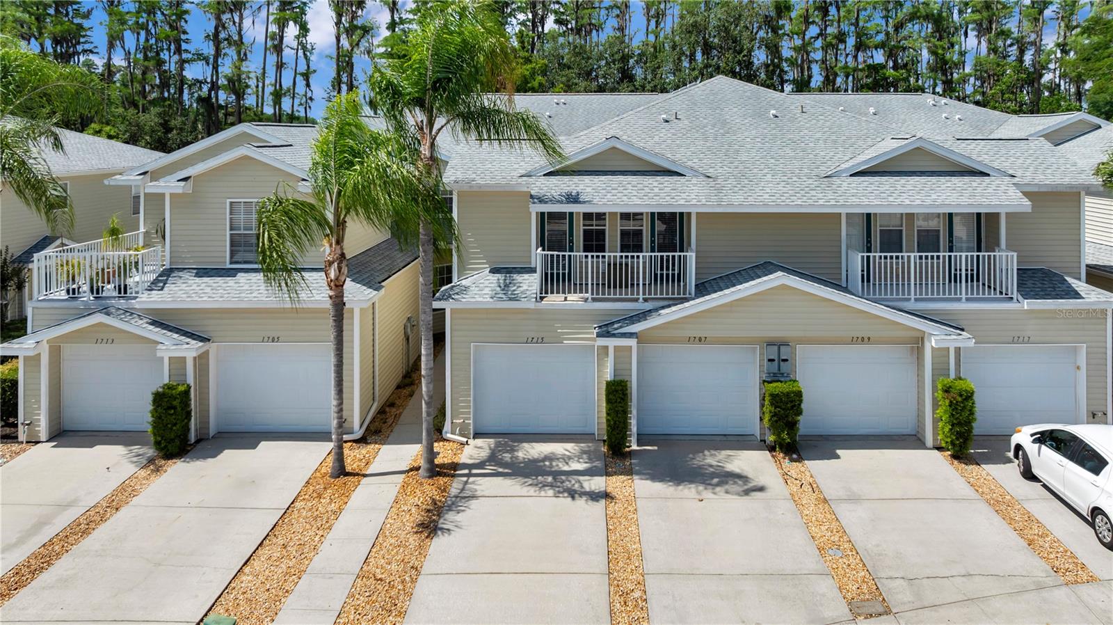 Move-in ready and beautifully situated, this 3-bedroom, 2-bath home offers comfort, convenience, and scenic views. The spacious primary suite features two walk-in closets and an en-suite bath with both a tub and a shower. Tile flooring runs through the wet areas, carpet adds warmth to the bedrooms, and laminate wood flooring flows throughout the remaining living spaces.
The kitchen is generously sized and includes all appliances, as well as a convenient bar-top seating area. Both secondary bedrooms share a unique feature with access doors opening to an outdoor seating area. Enjoy tranquil water and tree views of Lake Bird from the screened lanai and the primary bedroom.
Additional highlights include a separate laundry room, a one-car garage, and ample guest parking. The monthly HOA of $375 covers roofs, exterior maintenance, trash service, plus access to the community pool and dock. Located outside a flood zone and close to major shopping, restaurants, gyms, and Tampa amenities, this home combines low-maintenance living with an ideal location.
