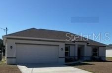 READY NOW!!  HOME IS COMPLETE and AVAILABLE!  The Siesta offers impressive exteriors offer concrete block with decorative textured finish, hurricane rated engineered wood trusses, dimensional shingles and outdoor patio. Beautiful 9’4” plate height ceilings with knockdown texture, coffered ceilings in owners suite and dining room, 5 ¼ baseboards throughout with deluxe kitchens with Thermofoil cabinets with MDF doors, granite countertops. ceramic tile flooring throughout. This new home includes one full year of builder's transferable warranty coverage and a 10-year limited structural warranty.