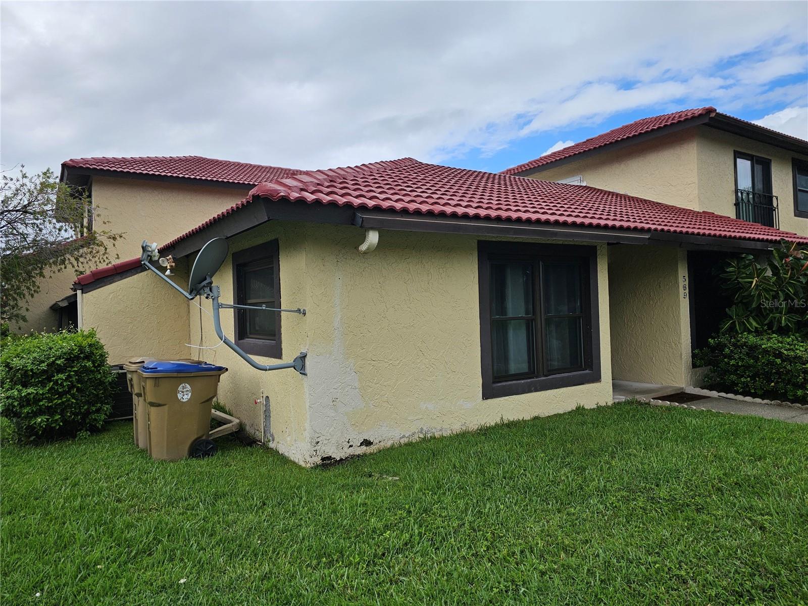 Beautifull Townhouses or village 2 bedroom, 2-bathroom all floors carpet and tile, laundry with washer and dryer, beautiful pool, A/c was change in 2023, big porch enclosure with widows and storage closed can use other family. Ideal to investment have tenant rented in 1425.00 monthly. master bedroom with walk in closet. The HOA include insurance of maintenance outside and roof, pool, private mailbox, club house, tennis and basketball play. Parking assigned with stickers. Have refrigerator range, dishwasher, disposal and washer and dryer.