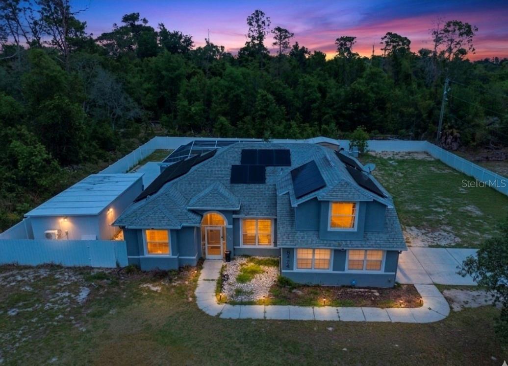 INCOME-PRODUCING POTENTIAL WITH DETACHED GUEST APARTMENT + PRIVATE 0.57 ACRE POOL HOME! Rare opportunity offering flexibility, space, and value with NO HOA and located in a NO FLOOD ZONE. This beautifully upgraded property delivers the perfect combination of modern living, privacy, and additional income potential in one package.
The standout feature is the detached guest apartment with its own private entrance, full kitchen, bedroom, bathroom, split A/C system, and complete independence—ideal for multigenerational living, long-term guests, or generating rental income.
Situated on a fully fenced 0.57-acre lot, the property offers exceptional privacy and functionality with a newly installed galvanized fence and remote-controlled sliding gate. There is ample space for RVs, boats, trailers, and additional vehicles, making it perfect for those who need room to spread out.
Inside the main home, the open-concept layout features brand-new ceramic tile flooring installed just two months ago, premium finishes, and a stunning waterfall quartz island that serves as the centerpiece of the modern kitchen. Soft-close cabinetry, custom storage solutions, and newer appliances complete the stylish design.
The spacious primary suite offers a relaxing retreat with a spa-inspired bathroom featuring a garden tub, dual vanities, and an upgraded walk-in shower with custom glass enclosure.
Step outside to a screened-in pool area designed for year-round enjoyment, entertaining, and peaceful Florida living.
Conveniently located near shopping, dining, boating, kayaking, Weeki Wachee Springs, and Gulf Coast beaches, this property combines lifestyle, space, and opportunity. Whether you're looking for a primary residence with income potential or a flexible multi-use property, this one is truly a rare find.