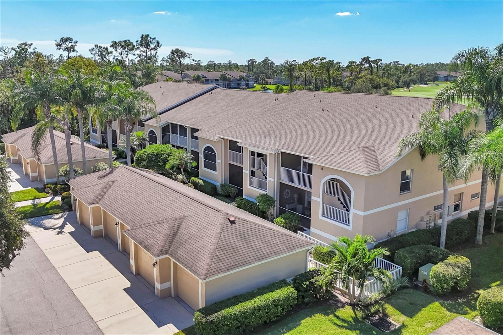 Welcome to Heritage Oaks Golf & Country Club—this beautifully appointed second-floor end unit offers exceptional space, abundant natural light, and turnkey furnishings for an effortless move-in experience.

Inside, you’ll find updated luxury flooring throughout the living areas, bedrooms, and den. The bright, open-concept layout seamlessly connects the kitchen, dining, and living spaces, creating an inviting setting for both everyday living and entertaining.

The spacious primary suite features two walk-in closets and an en-suite bath complete with a soaking tub, walk-in shower, and oversized vanity. A well-sized guest bedroom also includes a walk-in closet, while the den/office provides flexible use as a third bedroom or dedicated workspace.

Step out to the screened lanai and take in peaceful lake views overlooking the 14th hole of the championship golf course—an ideal spot to unwind and enjoy the Florida lifestyle. A private one-car garage with storage adds convenience and value.

Heritage Oaks is a premier private, gated golf community spanning over 500 acres and featuring a redesigned championship golf course, pro shop, and practice facilities. Residents enjoy five heated pools, a state-of-the-art fitness center with a full-time director, four tennis courts, and scenic walking trails. The full-service clubhouse offers both fine and casual dining, along with convenient takeout options.

Perfectly located near I-75 and University Town Center, and just a short drive to world-class beaches, downtown Sarasota, Lakewood Ranch, and more—this home offers the best of resort-style living in an unbeatable location.