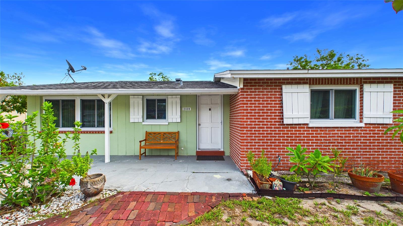 Very quaint, and lovingly maintained 2 bedroom home.  The garage has been converted to a beautifully large family room with lots of light. The home features ceramic tile and luxury vinyl flooring throughout for easy maintenance, all new impact windows replaced in 2019. Be at ease as this home is not in a flood zone.  The backyard is fenced for pets or just enjoying the outdoor experience. Sliding glass doors from the living room lead out to the open backyard screened in patio. Close to shopping, malls, restaurants, and more. Come see this home, you will not be disappointed