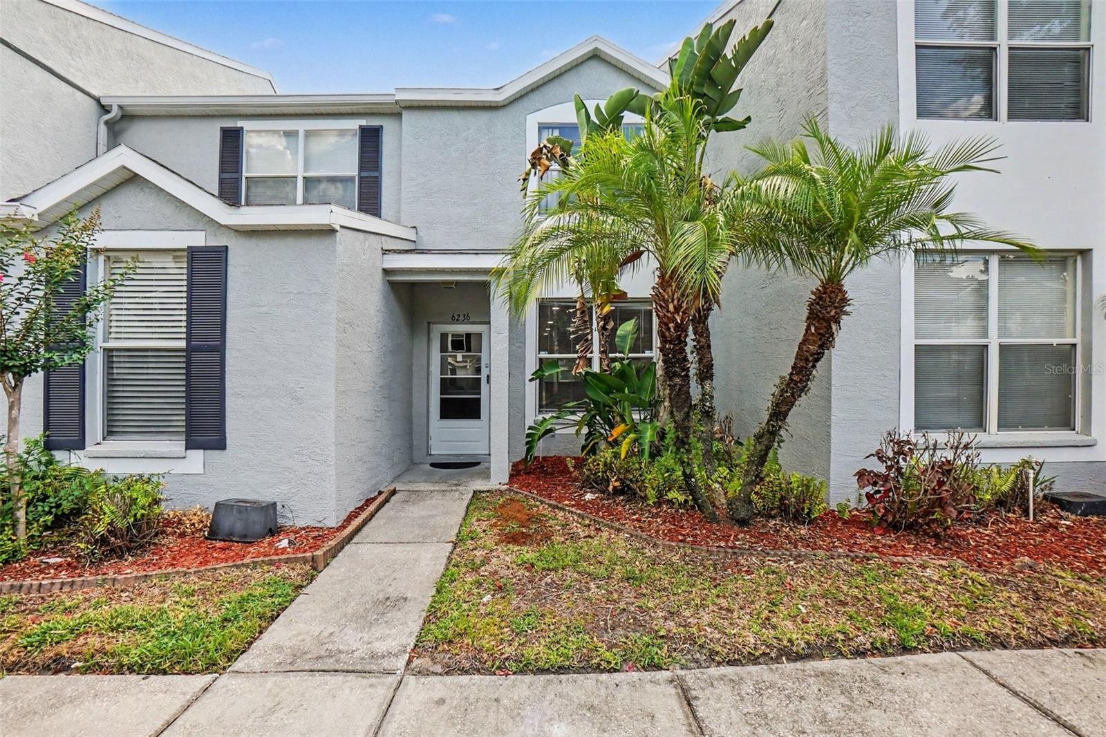 Welcome to this charming townhome in the desirable gated community of Osprey Run! This contemporary home features 2 spacious bedrooms and 2.5 bathrooms. The lower level features a open concept layout combining the kitchen, living, and dining areas, with sliding glass doors opening to a fully screened, covered back patio overlooking the community basin.

Upstairs, the dual master suite floor plan maximizes privacy and spatial comfort. Both spacious bedrooms boast impressive high ceilings, large walk-in closets, and private en-suite bathrooms. This unit includes assigned parking, an indoor laundry closet, and access to community amenities including a refreshing neighborhood pool. The monthly HOA fee comprehensively covers exterior maintenance, grounds maintenance, pest control, trash removal, and pool care.

Positioned in an unbeatable location for ultimate convenience, the property sits directly across the street from Target and prime local shopping. Commuting is effortless with rapid, easy access to the I-75 corridor, providing a straight drive north to Tampa or east toward Orlando. Property sold as-is. Schedule your viewing today!