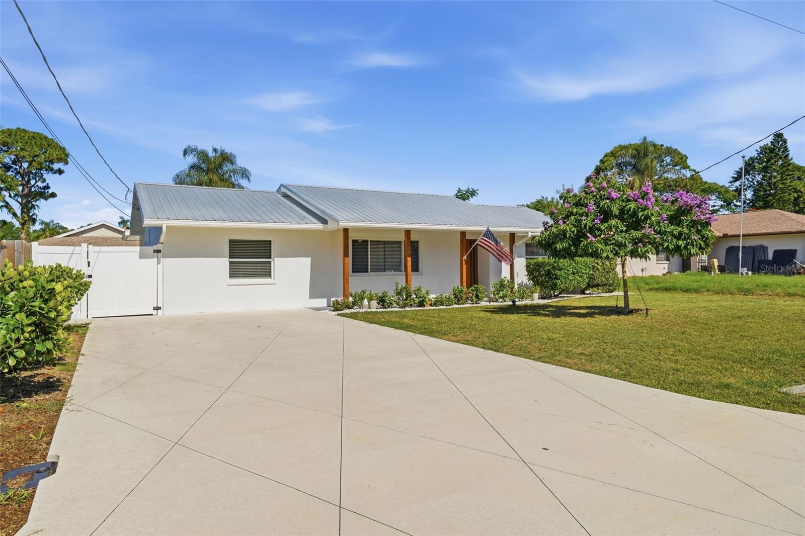 Move-in ready, fully renovated pool home in Sarasota Springs with NO HOA, NO CDD fees, and located in desirable Flood Zone X! This beautifully updated 3-bedroom, 2-bathroom home offers 1,817 square feet of living space on a fully fenced 0.17-acre lot and features extensive renovations completed throughout 2023–2026.

The open living spaces showcase a completely remodeled kitchen with new cabinetry, countertops, sink, and stainless steel appliances (excluding refrigerator), along with fully renovated bathrooms, new flooring, smooth ceilings with popcorn removal, fresh interior paint, new trim, doors, baseboards, LED lighting, ceiling fans, and a custom primary closet system.

Major capital improvements provide exceptional peace of mind, including a 2024 metal roof, 2025 solar panels, updated electrical brought to code, hurricane-rated sliding glass door, water purification system, French drains, irrigation system, Nest thermostat, and new vinyl privacy fence.

Enjoy year-round Florida living from the screened lanai overlooking the private swimming pool and spacious backyard. Recent exterior updates include fresh exterior paint, stucco repairs, new front porch details, refinished pool deck, updated lighting, gutters, and pool enclosure improvements.

Ideally located in central Sarasota, you'll enjoy quick access to Downtown Sarasota, Siesta Key Beach, I-75, Sarasota Memorial Hospital, shopping, restaurants, golf, parks, and everything Florida's Gulf Coast has to offer. If you're looking for an updated Sarasota pool home with major mechanical improvements already completed, this home is one you won't want to miss.