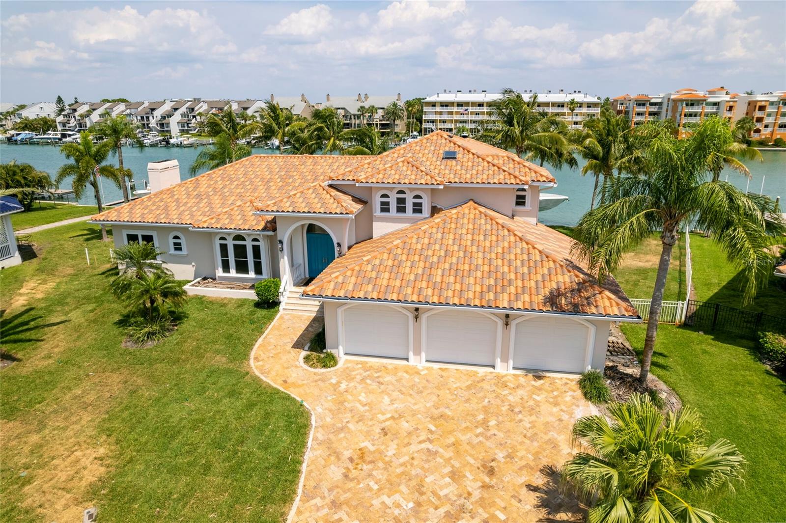 Under contract-accepting backup offers. New listing in Tierra Verde! SELLER FINANCING AVAILABLE! A true, waterfront beauty! One of the few homes available in this area for the best price! Boasting over 100 feet of water frontage, only 5 minutes away from the Gulf of Mexico, this residence is a boater’s dream! A large private Boat Dock with a 16,000 lb. lift and an additional boat slip with 50 amp power, along with a newly repaired sea wall, new sod and irrigation, limestone floor, travertine pavers and a beautiful, heated saltwater pool creates a true outdoor oasis. 
Now coming inside this magnificent home you will be greeted with a stunning open floor plan, perfect for entertaining, which encompasses your living, dining, family area and kitchen. The impressive features in these spaces include custom marble on the wet bar, updated shaker cabinets and quartz counters, high end appliances and beautiful stone accents. The rest of the house offers 4 bedrooms, 3.5 bathrooms, a 3 car garage, and loft. Upstairs, you will find a master suite with gorgeous wood flooring and a view from the balcony which words cannot do justice. And it doesn’t just stop at looks! This home also comes with a brand new, 3 layer roof, valued near $100,000 and complete with a lifetime warranty, 4 AC units to include an air conditioned garage, all less than 7 years old (1 unit 2016, 2 units in 2018, and 1 in 2021) and ALL hurricane impact windows and doors! With fresh paint inside and out and all of the duct work replaced and cleaned out, this place feels like new! All of this, conveniently situated at the end of one of the most family friendly cul-de-sacs you can find! Swing by and schedule a showing to make this, one of a kind piece of Florida luxury your own! Home inspection report available upon request....