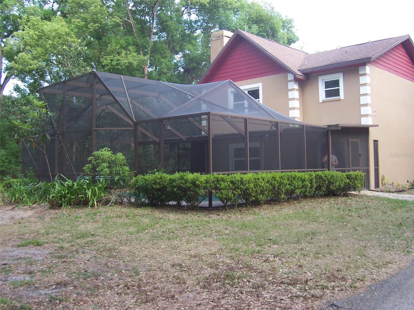 Hidden Privacy!  3 bedrooms, 2.5 bath home with an inground pool all located on 2.5 acres of a fenced oasis.   Bring all offers!!  The driveway takes you through the serene wood acreage to this Country Charmer.  This property features an inground pool, large outbuilding for storage of big toys, lawn equipment AND an eye-catching decorative hen house!  House is of solid construction featuring concrete block from the ground to the roof.  House features a large country kitchen with loads of cabinet space and room for a kitchen table as well.  The kitchen pantry is amazing.  The kitchen is convenient to the formal Dining Room.  A half bath is located downstairs for guest and pool convenience.   Living Room features a gorgeous fieldstone wood burning fireplace with wood mantle.  Inground pool features summer fun and the fireplace features winter warmth.  The beautiful captain style stairway leads you to the three spacious bedrooms.  Owners Bedroom features a double closet and overlooks the front of the house.  Owner's bath has been updated and features a 3 head walk in shower.   The 2nd and 3rd bedrooms overlook the backyard.  A spacious full bath with shower/tub combo is located in the upstairs hallway.  This 2.5 acre gated property offers the ability to plant a garden, create a fire pit or a serene sitting area in the woods or even plant your own fruit trees.  Some of the upgrades include updated windows and AC unit.  The roof was installed in 2017.  The expensive fixes have already been done for you.  So secluded yet convenient access to Tampa or Lakeland and all major highways.  Grocery stores, big box stores, restaurants, fast food, malls, hospitals and medical facilities are all in close proximity.  This is a must see to appreciate the property and house, don't miss out on this opportunity.  NO HOA's and NO CDD's!! Definitely not a cookier cutter house, it's one of a kind and definitely worth a look!