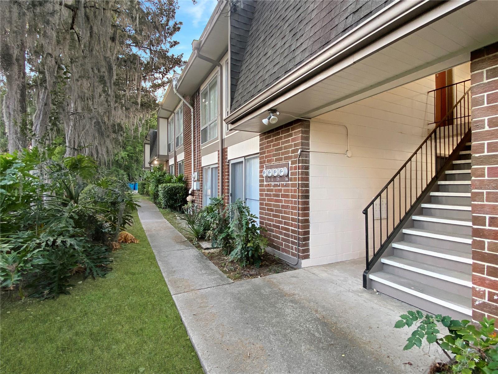 This furnished and move-in ready 1-bedroom / 1-bath condo in Summit House is situated within minutes of Shands & the VA Hospitals, RTS bus routes, UF Campus and downtown Gainesville. With an excellent location for students and medical professionals alike, this property provides a solid investment or first-time home buying opportunity. This spacious unit features an updated bathroom, durable tile and vinyl flooring throughout, a newer water heater (2019) and newer HVAC (2021) as well. The community features a pool, free parking for all residents and two on-site laundry facilities for added convenience. The HOA covers exterior building & grounds maintenance, trash, pest control & pool maintenance.