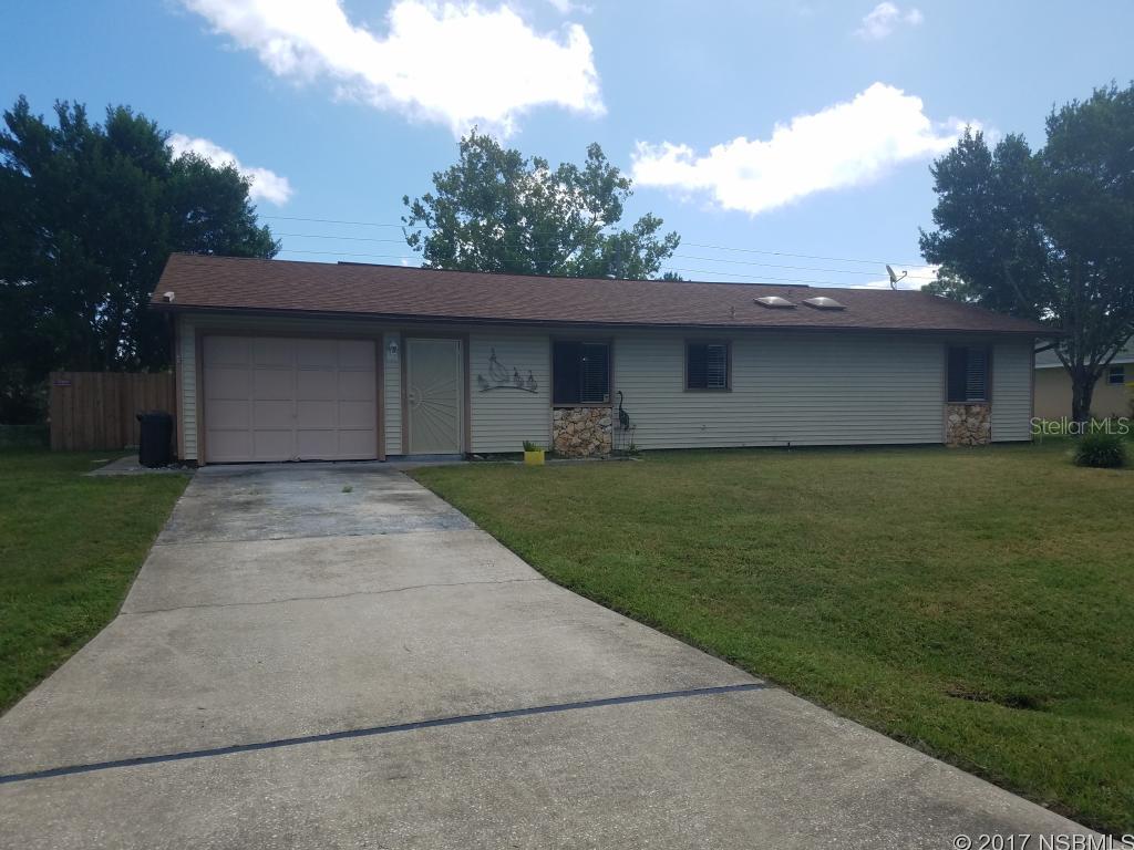 Back on the market with improvments! Charming three bedrooms and two bath home situated in the Florida Shores neighborhood. This home offers suitable living space, as well as a large yard and screened-in patio that is accessible with new French doors. The homes features include a one-car garage, vinyl siding, new flooring, fresh paint, and skylights. ;Water: City