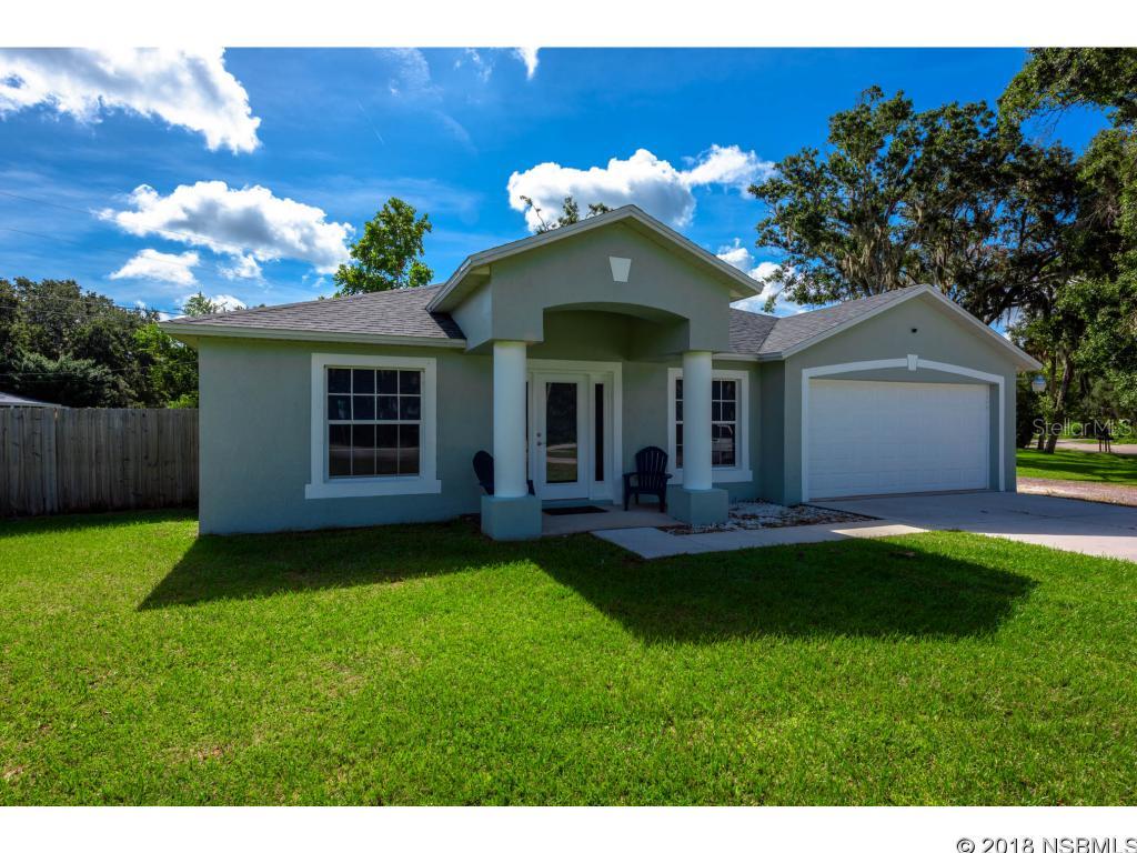 Built in 2000 this split plan 3 bedroom and 2 bathroom homes sits on a large 120x125 corner lot with boat/RV parking! Some of the recent expensive updates include a brand new roof, AC and driveway! This home has the ideal layout with a large family room and dining room in the front of the home with the kitchen at the center. Off the kitchen is a large living room with a custom niche for your TV and components to maximize the living space! Don't worry about vacuuming because all of the flooring including bedrooms is wood laminate and tile. The master bedroom is a great size with a walk-in closet, walk-in shower and separate tub. As a bonus the back screen porch was just installed that overlooks a HUGE fenced backyard with room for a pool plus an area for the kids to play! ;Water: City