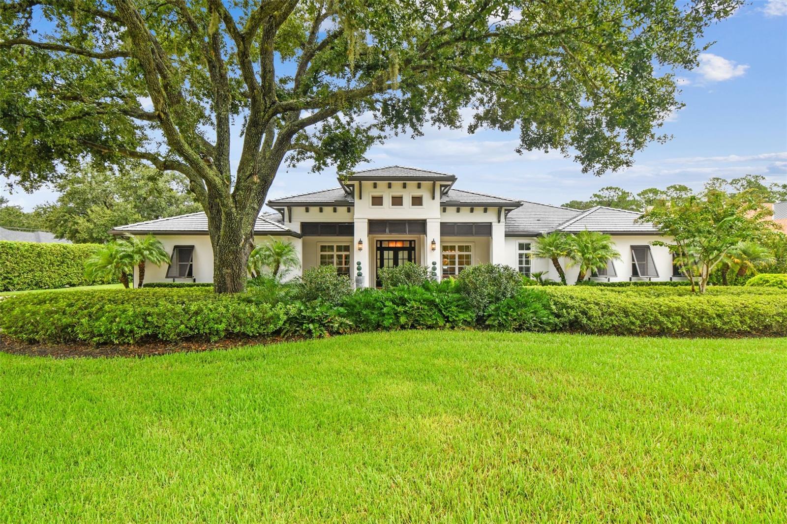 Step inside this custom-built 4-bedroom, 5-bath Odessa estate, where every bedroom includes its own en-suite bath. Custom lighting enhances the character and sophistication throughout. The primary suite offers a private sitting area, vaulted ceilings, dual walk-in closets, and a spa-inspired bath with oversized walk-in shower, freestanding tub, and dual vanities.

Gourmet Kitchen
A chef’s dream kitchen features a Sub-Zero refrigerator/freezer, Wolf cooktop, custom quartz island with ample seating, a separate breakfast area with built-in buffet with custom cabinets, and a wine fridge.

Outdoor Living
Enjoy resort-style living with a major custom saltwater pool featuring a 10-foot deep end, heated spa, sheer descent waterfall, and grotto. The expansive outdoor kitchen offers built-in seating, custom lighting, and a striking fireplace—perfect for entertaining. Retractable electronic screens on the porch let you transition seamlessly between indoor and outdoor living, while the handcrafted wood ceiling with designer lighting adds warmth and elegance. The fenced yard provides privacy and space for relaxation.

Garages & Extras
Two separate two-car garages flank each side of the home, complete with an electric vehicle charging station.

Additional Features
   •   Laundry room with sink and storage
   •   Custom mud area with built-ins for backpacks and shoes
   •   Plantation shutters throughout
   •   Living room with wood-beamed ceiling, custom fireplace, and designer lighting.
   •   Formal dining room with space to host family and friends

This meticulously maintained home combines luxury, function, and timeless design—a rare opportunity to own an Odessa estate with true character and charm.