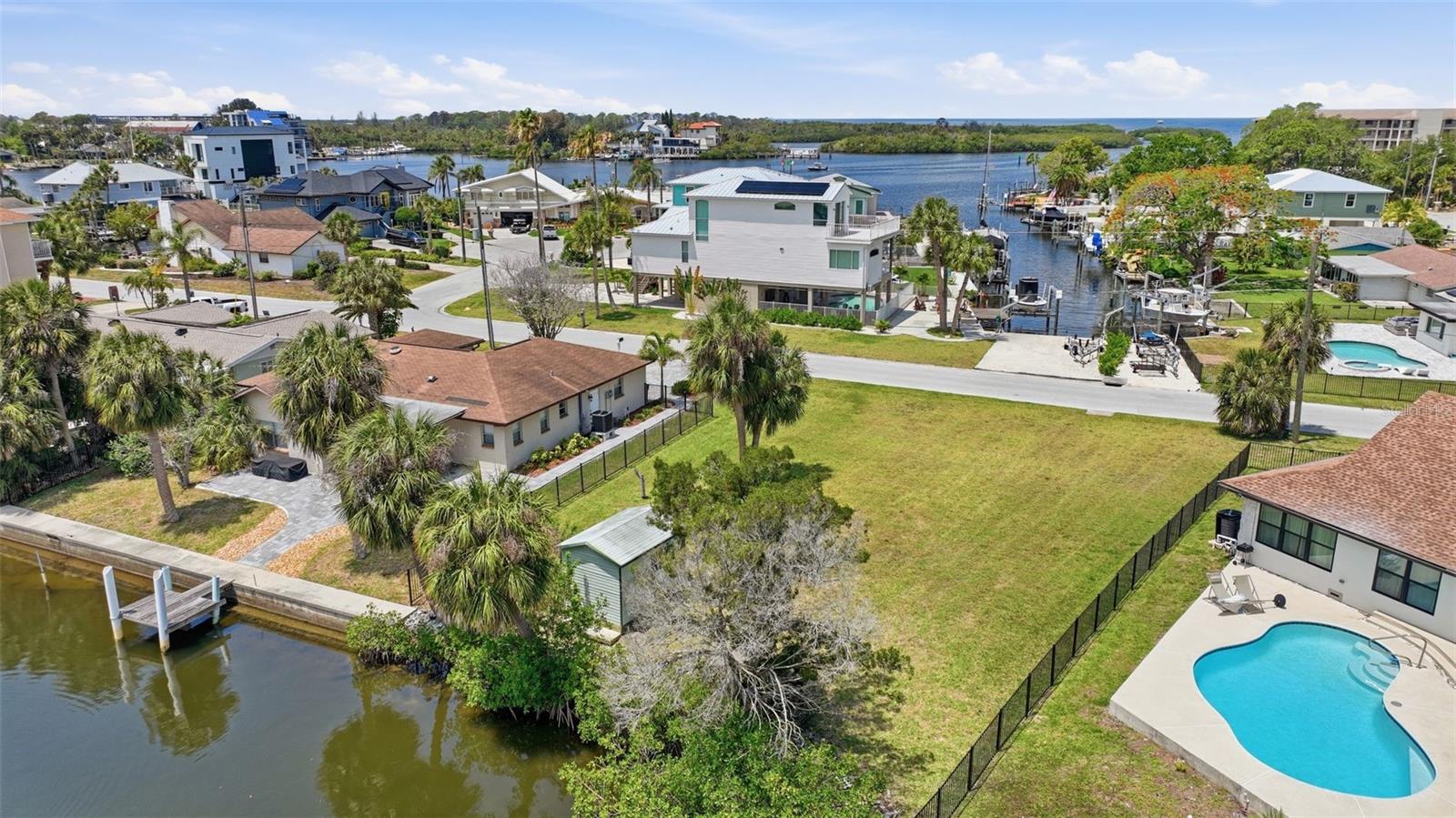Build your dream waterfront home on this exceptional Gulf-access homesite in the highly sought-after Harbor Isles community of Port Richey. Situated on a deep-water canal with direct access to the Gulf of America, this property offers the ultimate Florida boating lifestyle with endless opportunities for fishing, kayaking, and waterfront recreation right from your backyard.

Surrounded by attractive waterfront residences, this prime lot provides the perfect setting for a custom coastal retreat. Enjoy beautiful water views, stunning sunsets, and the convenience of keeping your boat just steps from your future home. With ample space to design and build, the possibilities are endless.

Ideally located near waterfront dining, marinas, parks, golf courses, shopping, and everyday conveniences, this property offers the perfect blend of tranquility and accessibility. Whether you're seeking a full-time residence, vacation getaway, or investment opportunity, this rare Gulf-access lot presents an outstanding opportunity to create your own slice of Florida paradise.

Don't miss your chance to own one of the area's premier waterfront homesites—bring your builder and start planning today.