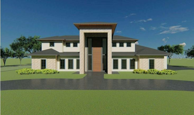 Under Construction. (Renovation) An exceptional opportunity awaits to take over an existing property within the prominent Isleworth Country Club community. Situated gracefully along the 17th fairway, this residence spans over 5,300 square feet offering enchanting vistas of Lake Louise. After completion you'll be welcomed by elegantly modernized spaces in this magnificent two-story masterpiece, boasting five bedrooms and five and a half bathrooms.

The layout of the residence has been re-envisioned to embrace an open-concept design, highlighted by marble flooring, granite countertops, radiant cabinetry, and designer light fixtures that adorn the kitchen, breakfast nook, and family room. These spaces are destined to become the dynamic focal point of the home, perfect for entertaining gatherings of all kinds.

The plans encompass a home theater, game room, sparkling pool, and a summer kitchen. Although the property is presently in the construction phase, the envisioned outcome holds the promise of an extraordinary and seamless fusion of opulence, natural surroundings, and refined living. Property is being sold 'AS-IS'. Buyer will be responsible for cost and completion of renovation.