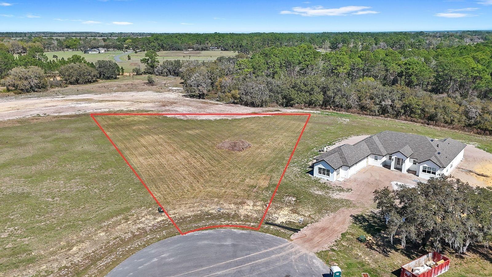 Build your dream home on this prime vacant lot in Shoreline Ranch, a gated community in Central Florida offering a rare combination of space, privacy, and lake lifestyle. What makes Shoreline Ranch unique is that you don’t have to choose between a neighborhood setting and access to the water. Residents enjoy private access to Lake Dalhousie via a convenient community boat ramp, where this spring-fed, sandy-bottom lake is ideal for boating, fishing, and year-round water sports.
This particular lot stands out as one of the most desirable in the community. It is situated in a cul-de-sac, offering a large, flat and usable lot. The rear of the property is tree-lined, and not immediate rear neighbor. Buyers have the flexibility to build with Precision Builders of Central Florida using thoughtfully designed plans already in place, bring a fully custom design, or work with an approved builder of their choice. Location is also a driver, as Shoreline Ranch is nearby all major conveniences, like: Publix, major dining and restaurants, and downtown Mount Dora.
Call today to schedule a private tour.