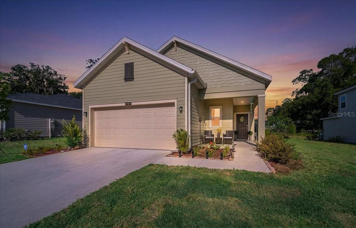 Welcome to 3902 NE 30th Terrace, Ocala, FL 34479—a beautiful 3-bedroom, 2.5-bath, two-story home built in 2025 in a vibrant, new community. Inside, discover sleek tile flooring, modern cabinetry, and a gourmet kitchen with quartz countertops, a deep stainless steel sink, and brand-new stainless appliances. The open floor plan seamlessly connects to a covered lanai through a sliding glass door, creating a perfect indoor-outdoor living space. A versatile upstairs office/playroom/craft room,  acts as a potential fourth bedroom. For peace of mind, the home includes an ADT security panel, door/window sensors, motion sensors, four Google Nest cameras, and a doorbell. Additional features include an AquaSure water filter system, electric lawnmower and tasteful wall décor upstairs. Conveniently located, you’re just minutes from top-rated elementary, middle, and high schools, as well as shopping, dining, and the heart of Ocala. Don’t miss this pristine, move-in-ready gem!