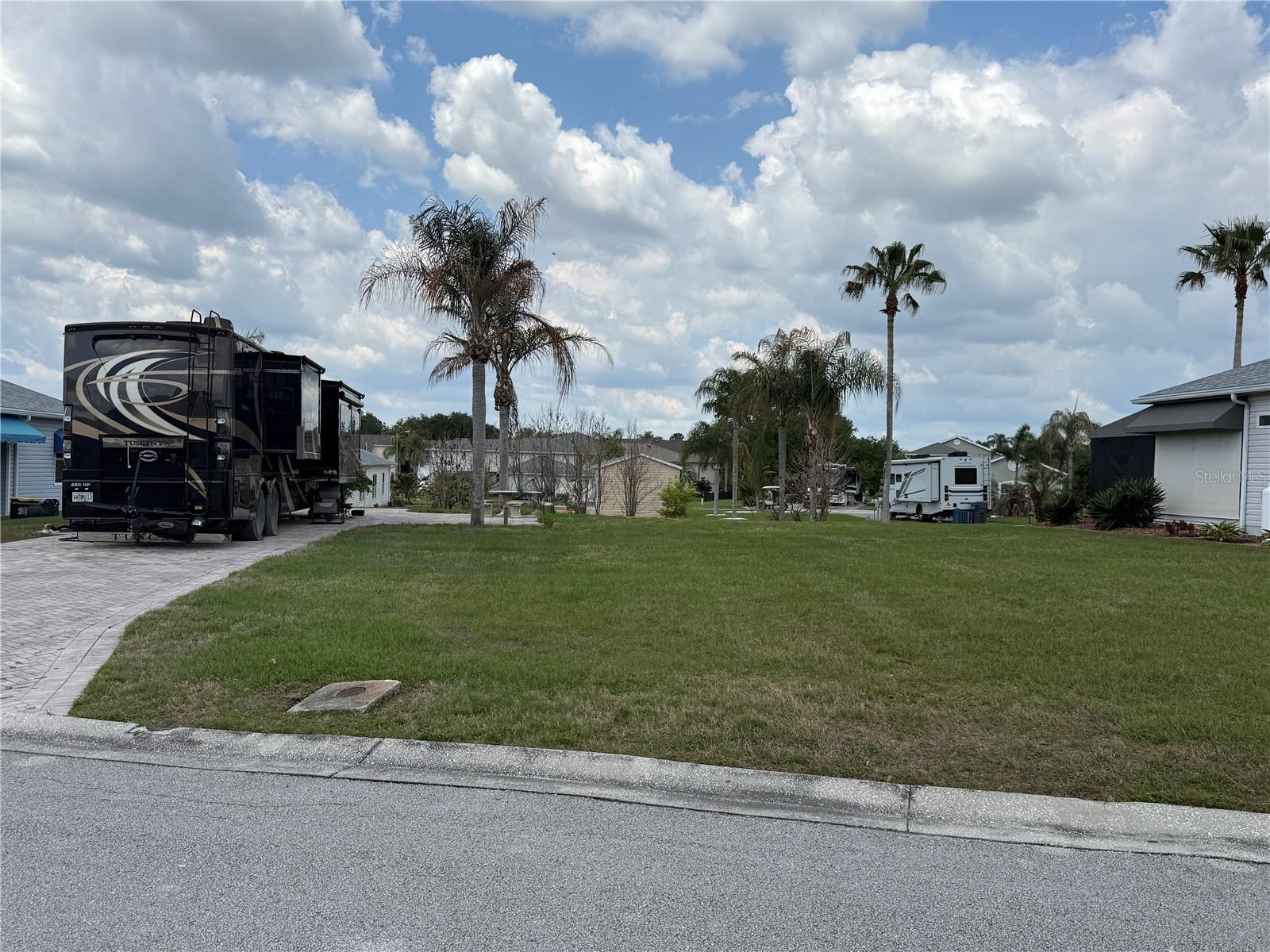 Take a look at this beautiful property just waiting for you.  It's a lot and half and is ready to be built on if you so choose.  With slightly under a quarter of an acre it's perfect to build a home on with plenty of room to spare. Located in the sought after community of Mt. Olive Shores North, a 55+ RV community.  Pick a builder of your choice or just live in the open space with your Class A motorhome.  Our community features two clubhouses with plenty of social events all year long.  Call today to see this beautiful property and enjoy our community of friends and neighbors.