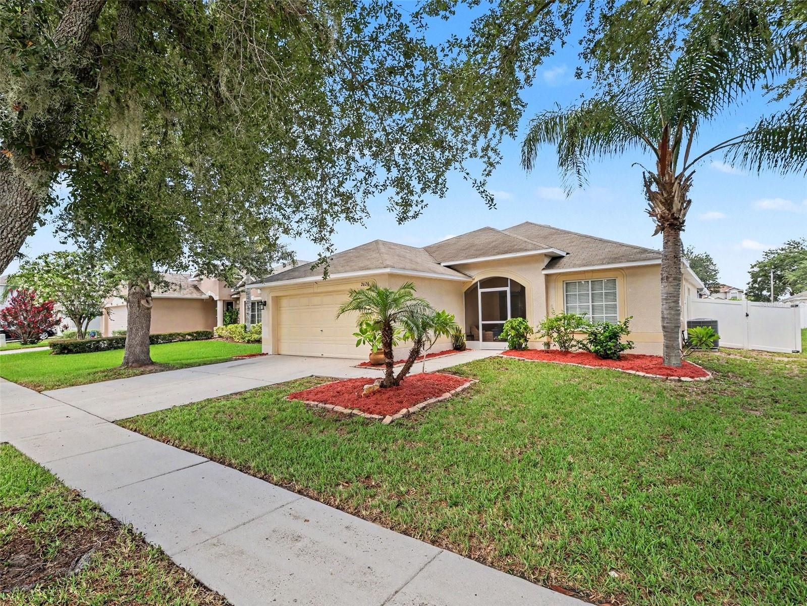 Welcome to 2620 Buckhorn Preserve Boulevard in the highly desirable Buckhorn Preserve community of Valrico! This beautifully maintained pool home offers the perfect blend of comfort, functionality, and Florida living. Step inside to discover a bright, open-concept floor plan enhanced by soaring vaulted ceilings, abundant natural light, and spacious living areas designed for both everyday living and effortless entertaining.

The heart of the home features a well-appointed kitchen with stainless steel appliances, ample cabinet and counter space, a breakfast bar, and a seamless connection to the living and dining areas, making it easy to stay connected with family and guests.

The spacious primary suite provides a relaxing retreat, while the additional bedrooms offer flexibility for family, guests, or a home office. Throughout the home, you'll find neutral finishes that allow you to move right in and make the space your own.

Step outside and experience what truly sets this property apart. The screened-in pool and expansive covered lanai create your own private backyard oasis, offering the perfect setting for weekend barbecues, relaxing afternoons, or year-round outdoor enjoyment. The fully fenced backyard provides added privacy and plenty of space for pets or play.

Conveniently located near top-rated schools, shopping, dining, parks, and major commuter routes, this home offers the ideal combination of peaceful neighborhood living and everyday convenience.

Don't miss your opportunity to own this move-in-ready Valrico pool home—schedule your private showing today!