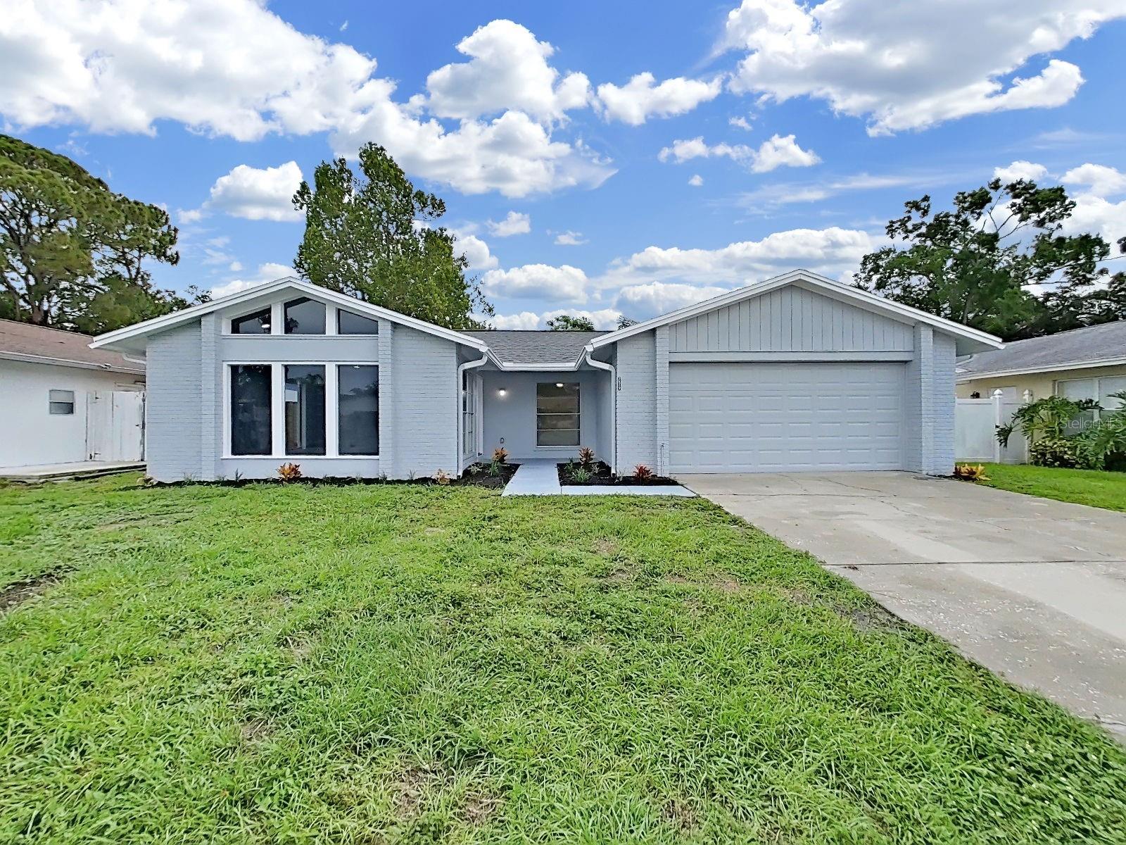 TEAR UP THE "HONEY-DO" LIST!! The big-ticket projects are already done for you. This pristine 3-bedroom, 2-bath home with a 2-car garage sits on a spacious 8,375-square-foot lot on a quiet court in Town 'N Country, complete with a sparkling private pool and fully privacy-fenced backyard with large screened & tiled patio. No HOA!! TOTAL PEACE OF MIND: Major systems are already handled — NEW Roof (2020) and NEW HVAC (2020). Inside, you'll find brand-new stainless appliances (2026), brand-new LVP flooring throughout (2026),  freshly painted, inside & out (2026) a fully remodeled kitchen, and updated bathrooms — all completed within the last few years. This one is truly move-in ready. THE LIFESTYLE: Zoned for Morgan Woods Elementary (0.5 miles), Webb Middle (1.3 miles), and Leto High (3.1 miles) — all three schools within 3 miles. Minutes from Publix at Twelve Oaks Plaza, AdventHealth Carrollwood (4.4 miles), and Town 'N Country Nature Preserve, with easy access to the Veterans Expressway for Tampa International Airport and downtown commutes. Flood Zone X means flood insurance isn't federally required here. Enjoy the freedom of NO HOA and NO CDD. Skip the repairs and move straight into worry-free living. Schedule your private tour today — this one won't last!