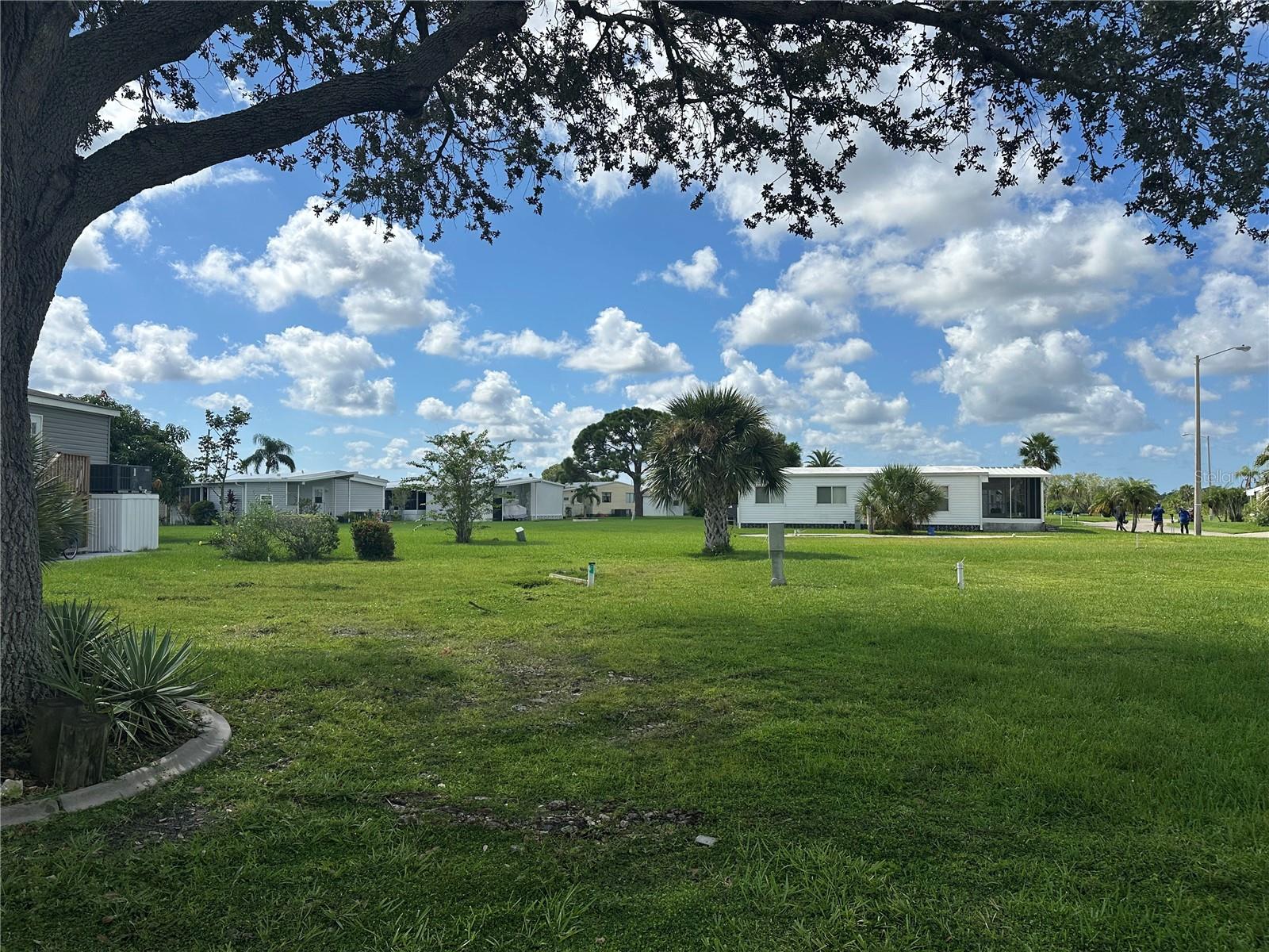 Build your Florida dream home in Harbor Cove, a premier 55+ waterfront community in North Port, FL! This vacant lot offers the perfect opportunity to design a custom residence in one of the area’s most desirable neighborhoods. Building packages available. Harbor Cove residents enjoy resort-style amenities, including two heated pools, a full-service marina with boat ramp and docks, clubhouse, fitness center, tennis and pickleball courts, bocce, shuffleboard, and an active calendar of clubs and social events. Ideally located near Gulf beaches, shopping, dining, and I-75, Harbor Cove blends a relaxed lifestyle with endless activities. Don’t miss your chance to join this sought-after community!