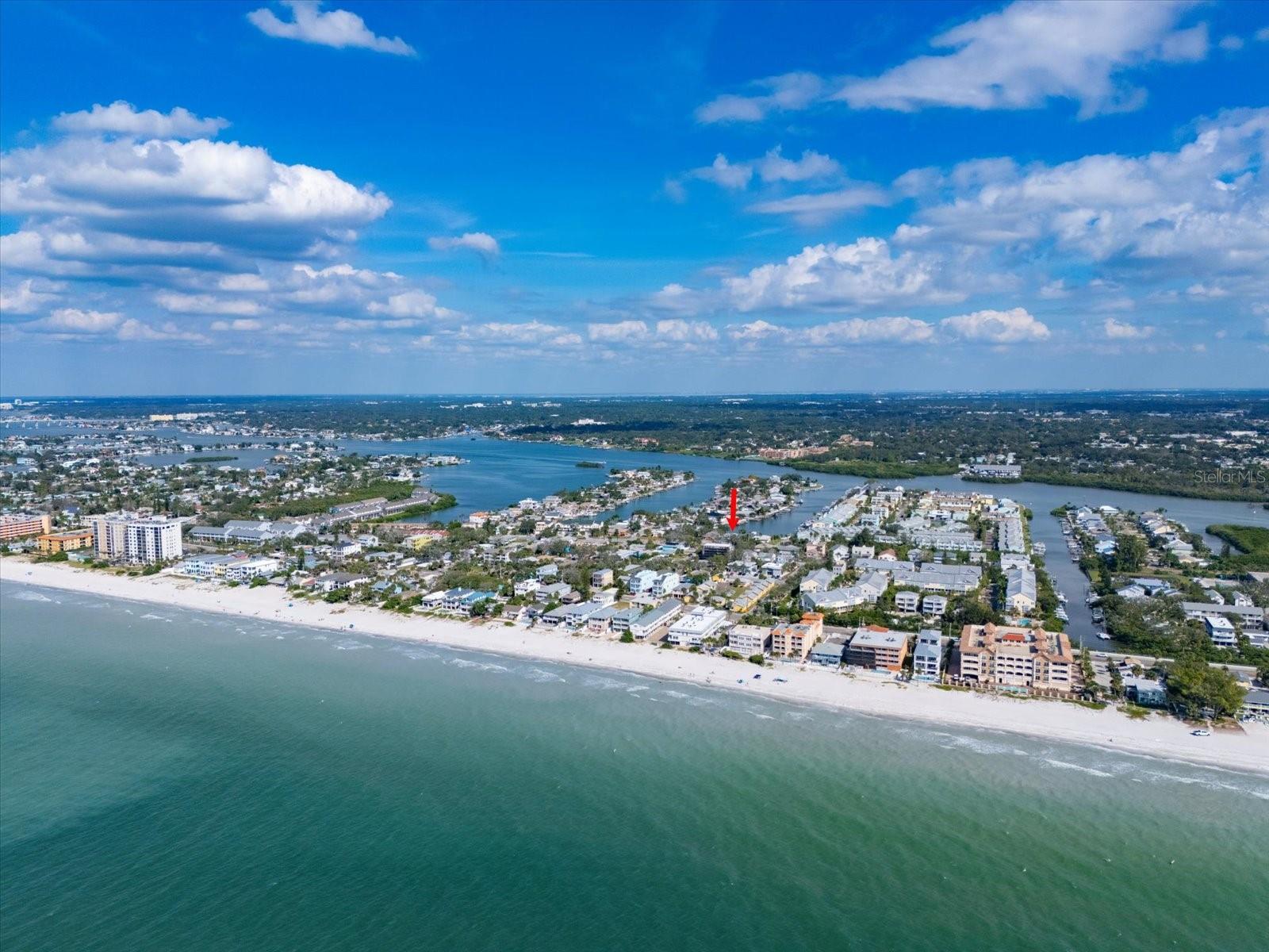 Investor's Dream on Indian Rocks Beach! This fully remodeled, turn-key 4-plex offers an exceptional opportunity for short term rental income in one of Florida’s most desirable coastal communities of Indian Rocks Beach. Each of the four 1 bed / 1 bath units is beautifully furnished, featuring king-size beds, queen pull-out sofas, vaulted ceilings, and modern kitchens with all new appliances. On-site washer & dryer, and each unit is equipped with custom flood barriers for peace of mind. Two front units boast Intracoastal Waterway views, and the property includes a private boat dock—perfect for boating enthusiasts and guests. No rental restrictions make this ideal for Airbnb/VRBO. Located just 2 blocks from the beach and within walking distance to top-rated restaurants and shops. Convenient access to Tampa Bay airports adds to the appeal for outof-town visitors. Don't miss this rare, income-generating coastal gem—