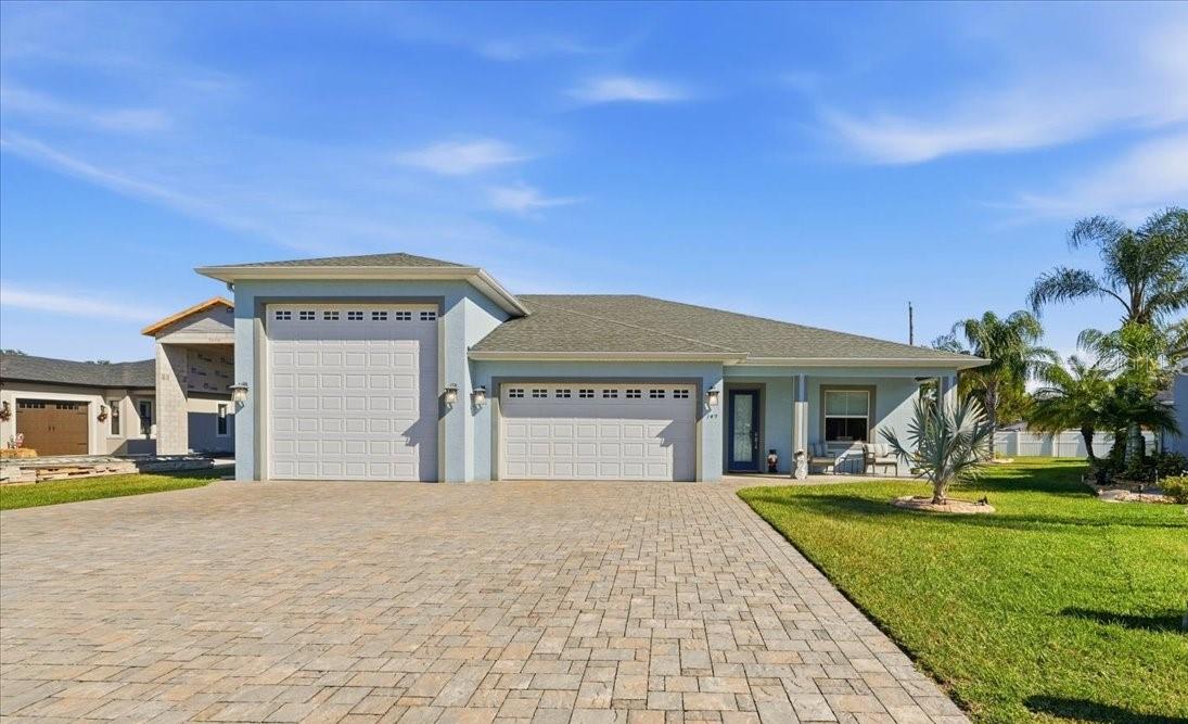 Welcome to Mt. Olive Shores North, Central Florida’s premier 55+ RV community—where luxury living seamlessly meets resort-style convenience. I am excited to introduce you to a stunning 2-bedroom, 2-bath single-family home, built in 2020, that offers the perfect blend of modern comfort and RV garage storage excellence. This beautiful home features a spacious open-concept living and dining area, complemented by a gourmet kitchen with island, granite countertops, stainless steel appliances including a french door “cafe” built in oven, induction stovetop and custom pantry cabinetry—ideal for entertaining family and friends. The primary suite boasts a walk-in custom built-in design closet and a spa-inspired bathroom with a relaxing tub, double vanity, and tiled shower. The second bedroom, complete with a built-in closet system, provides versatile space for guests, hobbies, or a dedicated home office. Step outside to enjoy a beautiful spacious yard with screened lanai, an extended cage area, and a fenced backyard - perfect for those furry friends. The home also includes a 2-car garage that opens directly into a generous 50x16.5 RV garage, making it an ideal haven for RV enthusiasts. Additional features such as a central vacuum, whole house generator and solar panels help reduce energy costs and ensure peace of mind. As part of our community, you’ll have access to a secure, gated entrance and an array of resort-style amenities, including a club house, pool, fitness center, social activities, and lake access—truly offering a vibrant, active lifestyle in one of Florida’s most sought-after RV communities. Don’t miss this exceptional opportunity to enjoy luxury, convenience, and community. Call today to schedule an appointment and see firsthand what makes Mt. Olive Shores North the perfect place to call home!