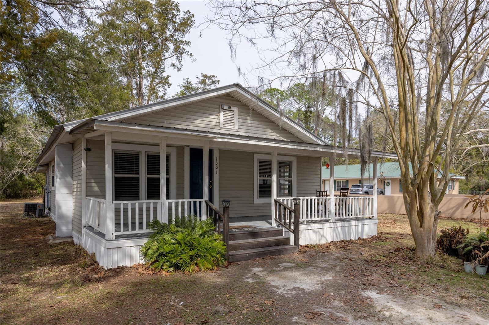 Short Sale. BACK ON MARKET - PRICE HAS NOT BEEN APPROVED BY LENDER. Charming 3-bedroom, 1-bath cottage situated on a spacious 0.39-acre corner lot within city limits. This solid home offers a great layout featuring a living room, separate dining room, and dedicated laundry room. Enjoy relaxing mornings on the covered front porch and the peace of mind of a metal roof, vinyl siding, and newer AC and Water Heater. With great bones and plenty of character, this property offers an excellent opportunity to add your personal touches while living comfortably in the home. The price reflects minor cosmetic updates needed, making it a smart option for buyers looking to build equity. Experience the feel of country-style living with the convenience of being close to town. Cute, functional, and full of potential — come see the possibilities!