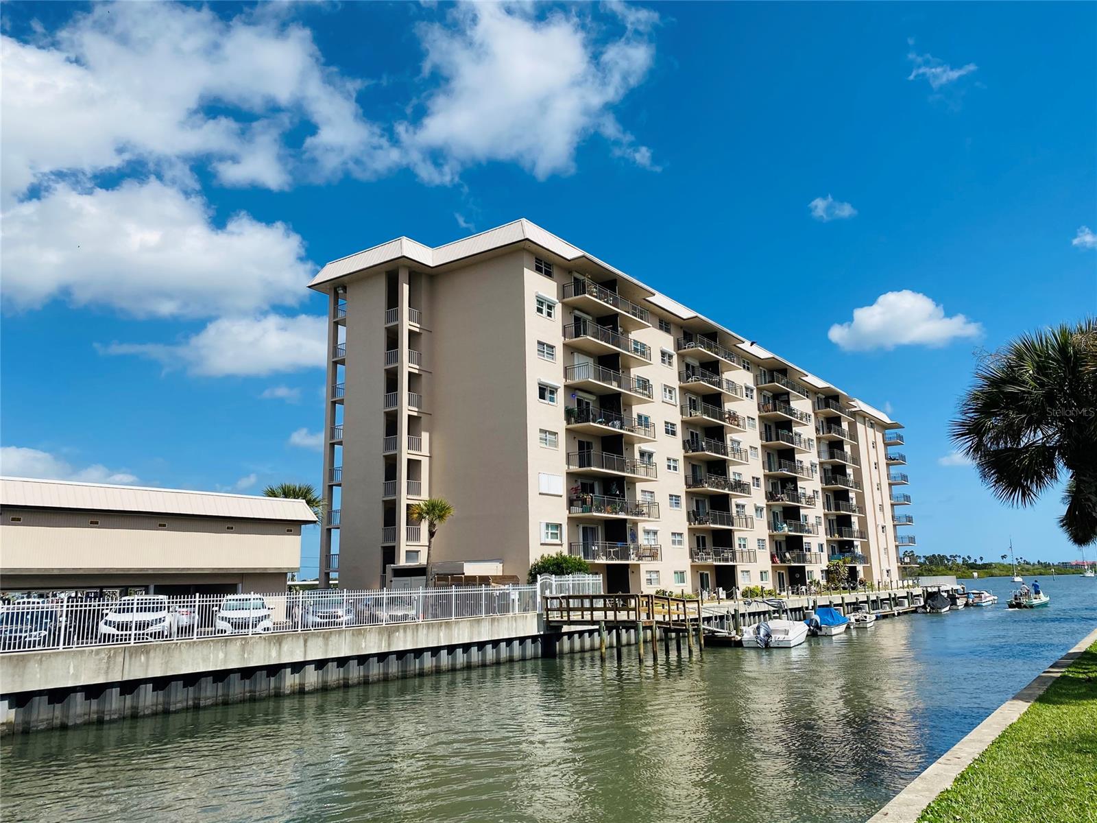 Great water views from this second floor condo from our balcony, great location overall, close to Canal Street Business District, Brannon Center and walking distance to the boat marina and the new restaurant River Deck NSB. 55+ adult community, pool and seawall just updated. Spacious 2 bedroom 1 1/2 bath condo with an open feel. Walk in closets in both bedrooms. Laminate wood floors and tile. Newer windows, storm shutters on windows and sliding door. Front door has a sliding storm door. Partially furnished, storage unit in separate locked building and a workshop for your hobbies. Comes with a covered parking space, adds value to the condo, not all condos have covered parking. Boat slips in side canal, check with office for availability.  Fishing Pier next door and park, Walk to Saturday Farmers Market, art shows and events. Walk the loop for exercise. Just minutes to the beach and access to the boat ramp to launch into the river. Total 10 boat slips at Captains Quarters, there is a waiting list, in order to get on the waiting list you need to go to the front office and give a deposit. Won't last long! ;LocationDescription: Condo ;Water: City