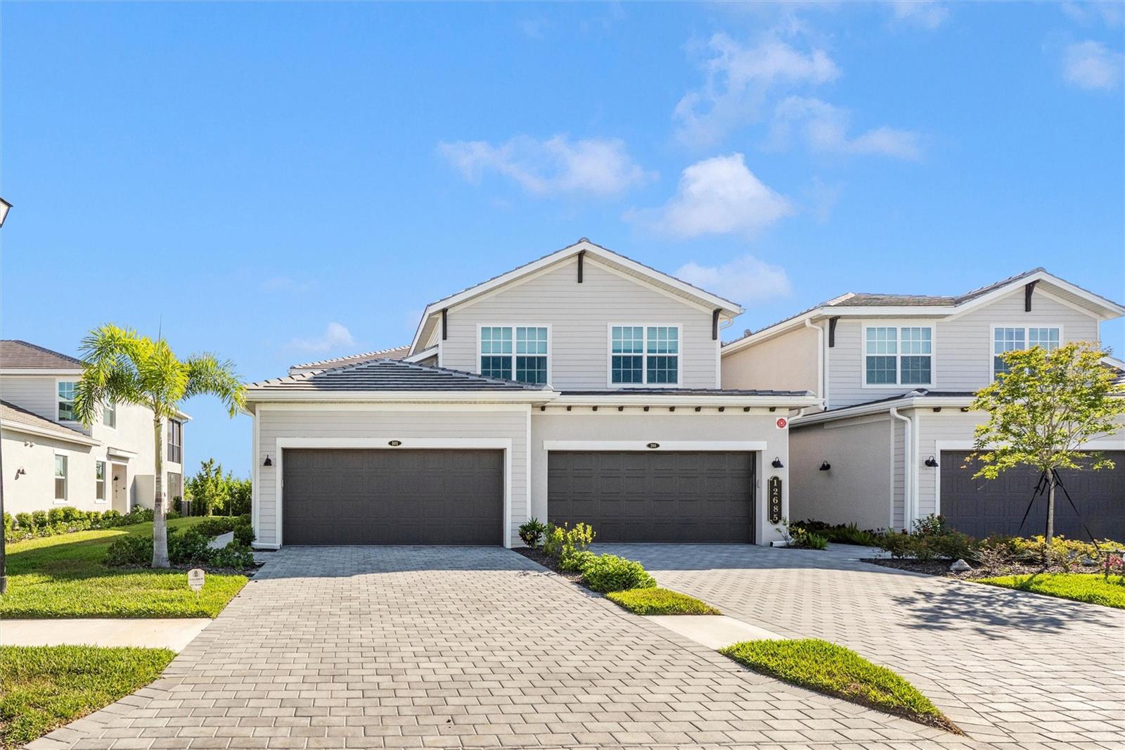 Experience resort-style living in this beautifully appointed 3-bedroom, 2-bath coach home located in the highly sought-after Wellen Park Golf & Country Club. Featuring a spacious open-concept floor plan, this home offers a bright and airy living area, tasteful upgrades to include decorative wall trim, beautiful lighting, modern kitchen with ample cabinetry and countertop space, and a private screened lanai perfect for relaxing and enjoying peaceful preserve views. The generous primary suite includes dual walk-in closets and a spa-inspired bath, while two additional bedrooms provide comfort and flexibility for guests or a home office. A 2-car garage with epoxy floors adds convenience and extra storage. Residents enjoy access to championship golf (deeded with this home), resort-style pools, clubhouse dining, fitness center, tennis, pickleball, and an active social lifestyle, all just minutes from Downtown Wellen Park, shopping, dining, entertainment, and Gulf beaches.