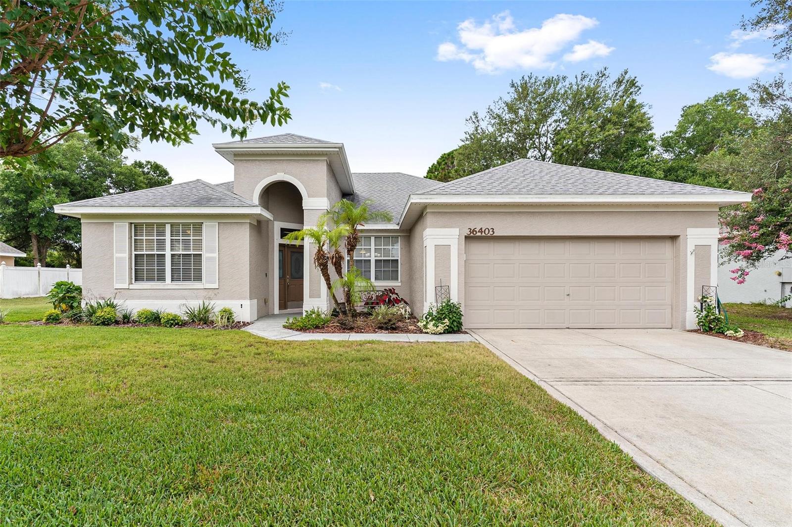 Welcome home to this spacious 4-bedroom, 3-bathroom property offering comfort, functionality, and room to grow. Situated with no rear neighbors, this home provides added privacy and plenty of space to add a future pool, with a convenient pool bath already in place. Inside, you'll find two large living areas, perfect for entertaining or creating separate spaces for relaxation and gathering. Elegant 6-inch crown molding runs throughout the home, adding a touch of sophistication. French doors open to a beautiful screened porch, creating the perfect indoor-outdoor living space. The kitchen is designed for both everyday living and entertaining, featuring a massive 10-foot breakfast bar, abundant 42-inch maple cabinetry, and a spacious eat-in dining area. The inside laundry room offers additional cabinet storage, while pull-down attic stairs provide easy access to extra storage space. This home also includes several upgraded builder options from the original floor plan, including a built-in workstation and a private third bathroom connected to the fourth bedroom, creating an ideal guest suite or multi-generational living space. Major updates have already been completed, including a new roof and HVAC system in 2021. The sprinkler system was completely redone just two years ago with all new zones and sprinkler heads. Don't miss the opportunity to make this move-in-ready home yours. Be sure to ask about the solar panels and the energy savings they provide!