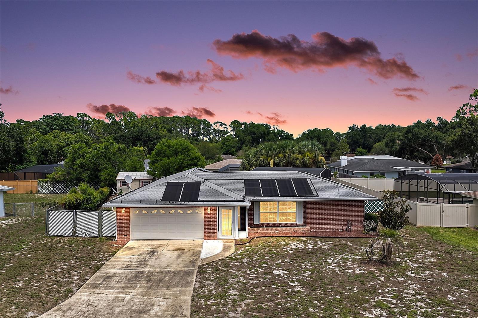 Virtually Staged. Welcome to this 3-bedroom, 2-bath POOL home in the Lake Dora Pines community! Enjoy access to the community dock on beautiful Lake Dora, part of the renowned Harris Chain of Lakes, where boating, fishing, and waterfront living are right at your fingertips. Historic Mount Dora, with its charming boutiques, restaurants, festivals, and entertainment, is just a short drive away.
Inside, you'll find a bright and inviting living and dining area with a functional split-bedroom floor plan. The spacious primary suite features an en-suite bath and a walk-in closet, offering comfort and privacy. Two additional bedrooms are tucked away off the kitchen hallway and share a guest bath with convenient access to the Florida room.
The screened, under-roof Florida room provides the perfect place to enjoy your morning coffee, unwind with a good book, or relax with an evening beverage while overlooking the backyard. Step outside to your own private tropical retreat featuring a screened lagoon-style pool, ideal for year-round Florida living. A separate patio offers the perfect space for grilling and outdoor entertaining.
Situated on an oversized lot with plenty of room to enjoy. This home also features solar panels to help keep electric bills low. With endless potential, it's the perfect opportunity for a new owner to add their personal style and create their dream home.
Roof (2016) 
Schedule your private showing today and discover everything this Lake Dora Pines gem has to enjoy!