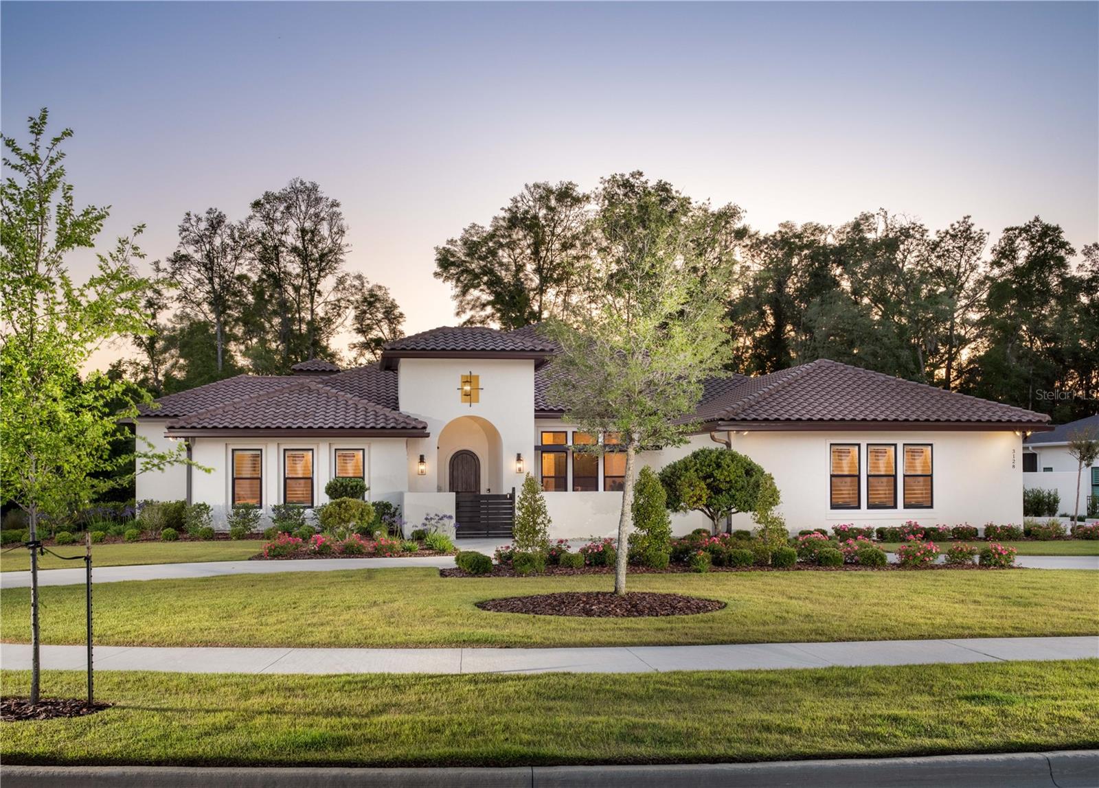 Discover the luxury and comfort in this magnificent 5200 sqft residence with a separate, fully-equipped 648 sqft ‘Casita’, nestled on a one-acre lot. The seamless blend of elegance and modern convenience will cater to your every need, making it the perfect sanctuary for homeowners to share with their friends/family. After admiring the tile roofing and passing through the private courtyard, you will step into the main house. The 18-foot foyer ceiling, marble and porcelain inlay runner, and elegant archway take your breath away while you progress into the heart of the home. Beautiful wood flooring, carefully selected tile, and iron light fixtures throughout provide continuity and a subtle Spanish and California impression. This large home boasts five generously-sized bedrooms, each with its own bathroom, and two additional half baths, providing ample space and privacy for family and guests. Entertain guests with a perfectly tempered bottle of wine from the wine ‘cellar’, media room with its massive 134-inch screen that’s featuring ‘the game’ or a fantastic movie, and pleasant and expansive outdoor living space.
When you choose to cook, experience the thrill of doing so in a gourmet kitchen, featuring a 36-inch Bluestar 8 burner gas range, 36-inch TRUE individual refrigerator/freezer, 5-foot galley sink, and an abundance of storage for every kitchen tool, dish, & appliance you could ever need! The kitchen and heart of the home are surrounded by windows and stackable sliding doors providing excellent views and natural lighting, and effortlessly determine the degree of sunshine with remote-controlled blinds for the perfect balance of natural light and privacy. 
The primary suite includes a gas fireplace, incredible views of the pool, another private courtyard, automated blinds, and a well-designed primary bathroom. There are two walk-in custom California closets that provide abundant organization.
A priceless feature of this exquisite property is the fully independent ‘Casita’. At nearly 650 sqft the living space includes a comfortable living room and sizable bedroom with a walk-in closet. It also includes a full kitchen that boasts a Cafe stove/oven, microwave, and a Bosch dishwasher, ensuring that your guests experience the same level of luxury as in the main house. Completing this ‘small house’ is a full bath and an in-unit washer/dryer.
Step outside to experience resort-style living in your own backyard. The extensive outdoor kitchen and entertainment area comes fully equipped with a 48-inch grill, side burners, an undercounter refrigerator, an ice chest, a sink, and durable NatureKast Cabinetry. The 60-foot saline pool with a sun shelf and hot tub provides the perfect space to unwind, complemented by an outdoor shower and half bath. Not only beautiful and smart, this home is also practical as well and includes a whole house generator for those unexpected power outages and TONS of storage!
The entire property is wired with a Savant whole-home control system, making managing AV, security cameras, door locks, the garage door, and HVAC easy and convenient. 
Focus on what truly matters - enjoying the tranquility and luxury of your dream home and invest in more than just a property; invest in a lifestyle where every day feels like a vacation.