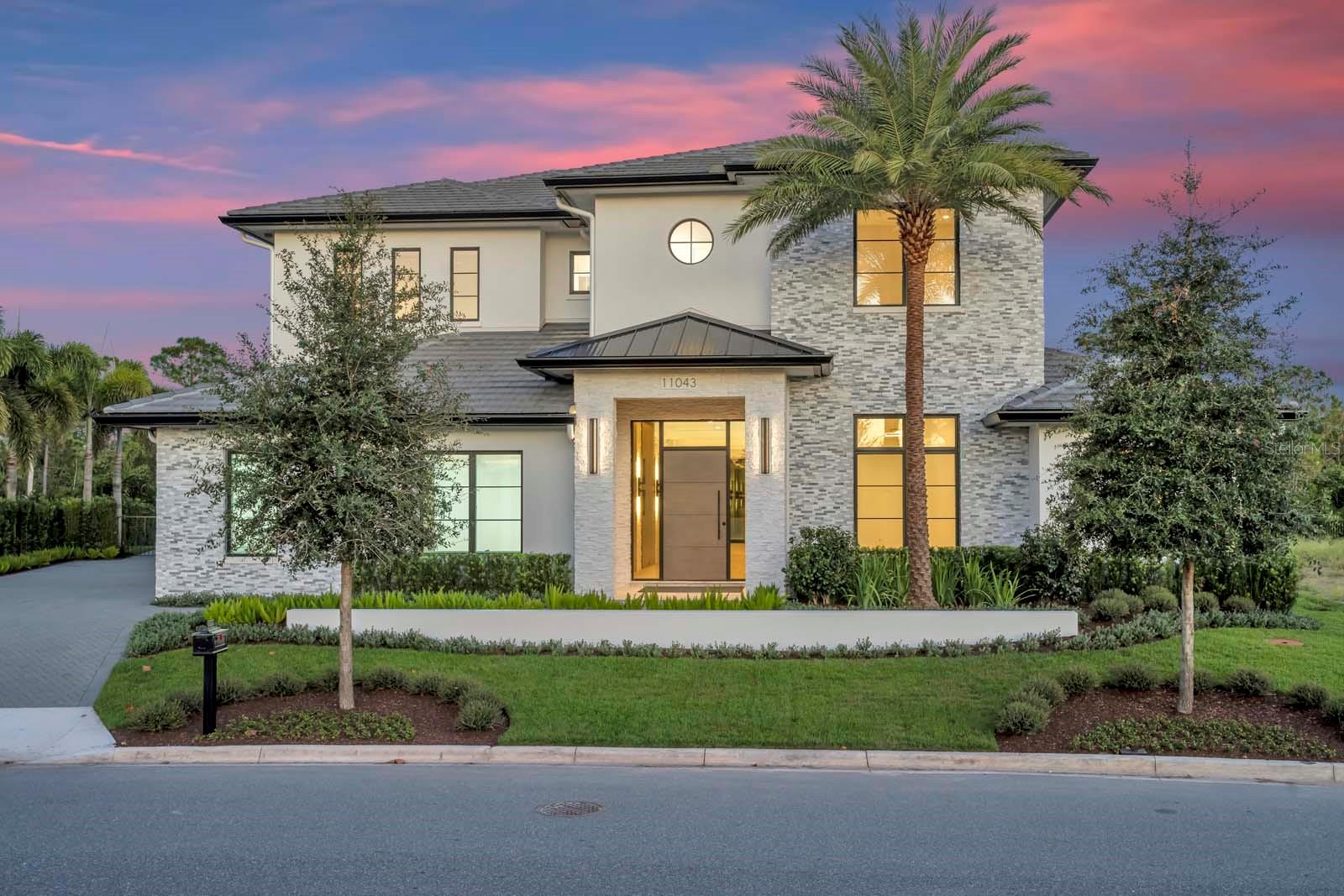 One or more photo(s) has been virtually staged. Expertly built by Maroon Fine Homes, and located in the new Cromwell expansion at Lake Nona Golf & Country Club, this luxurious custom home is perfectly situated with direct access to the Club’s amenity base, The United States Tennis Association’s National Campus, and Lake Nona’s Town Center.

The warm, contemporary residence boasts five bedrooms, five full and two half baths, ranging over an impressive 6,000 sq. ft. floor plan. Custom floor to ceiling millwork, with integrated lighting, and a floating stair case create a stunning entry into the home’s open floor plan. A private, glass enclosed study precedes the large great room, which is set against the serene conservation views, and is anchored by the gorgeous gourmet kitchen and stunning fire place. 

In addition to the first-floor guest suite and sitting room, the main level features the expansive owner’s suite complete with a spa-like primary bath and a 13’ by 26’ custom walk-in closet inspired by a luxury merchandise experience and offering a private vanity.  

The beautiful landscaping highlights all this home has to offer and is the perfect backdrop to the spectacular outdoor oasis complete with multiple covered lanais, a resort-style plunge and lap pool, spa and summer kitchen.  Additional features include a Scullery Kitchen, Second Floor Loft, a Three-Car Garage.

Price includes a social membership initiation fee to Lake Nona Golf & Country Club, subject to application and acceptance. Members of Lake Nona Golf & Country Club enjoy a wealth of amenities, including a premier championship golf course, 40,000-square-foot Clubhouse with an 18-room Lodge, a Bath & Racquet Club with tennis facilities, a resort-style, lakeside pool, year-round children’s programming, 24-hour gated security and outstanding water-based recreation on a trio of waterways.