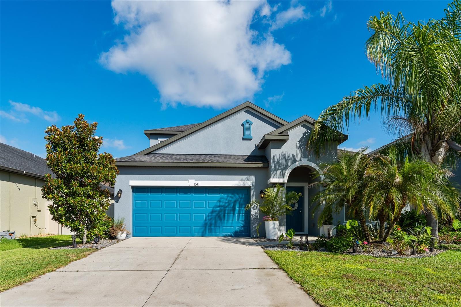 Welcome to this beautifully maintained 2017 home in the highly desirable Union Park community of Wesley Chapel. Offering 3 bedrooms, 2.5 bathrooms, a private office, and 2,361 sq ft of thoughtfully designed living space, this move-in-ready home combines comfort, style, and functionality. The open floor plan features vaulted ceilings, abundant natural light, designer ceramic plank tile, fresh interior paint, and a spacious chef’s kitchen with granite countertops, stainless steel appliances, a large island with bar seating, 42-inch espresso cabinetry, and a pantry. The primary suite is conveniently located on the first floor along with two additional bedrooms, while the upstairs bonus room with a walk-in closet provides the perfect space for a media room, playroom, or private retreat. Enjoy working from home in the dedicated office and relax outdoors on the covered lanai overlooking a fully fenced and landscaped backyard. Union Park offers resort-style amenities, including a clubhouse, pool, fitness center, splash pad, dog park, playground, and miles of walking trails. HOA includes high-speed internet and cable. Ideally located near top-rated schools, Wiregrass Mall, Tampa Premium Outlets, Krate at the Grove, and I-75.