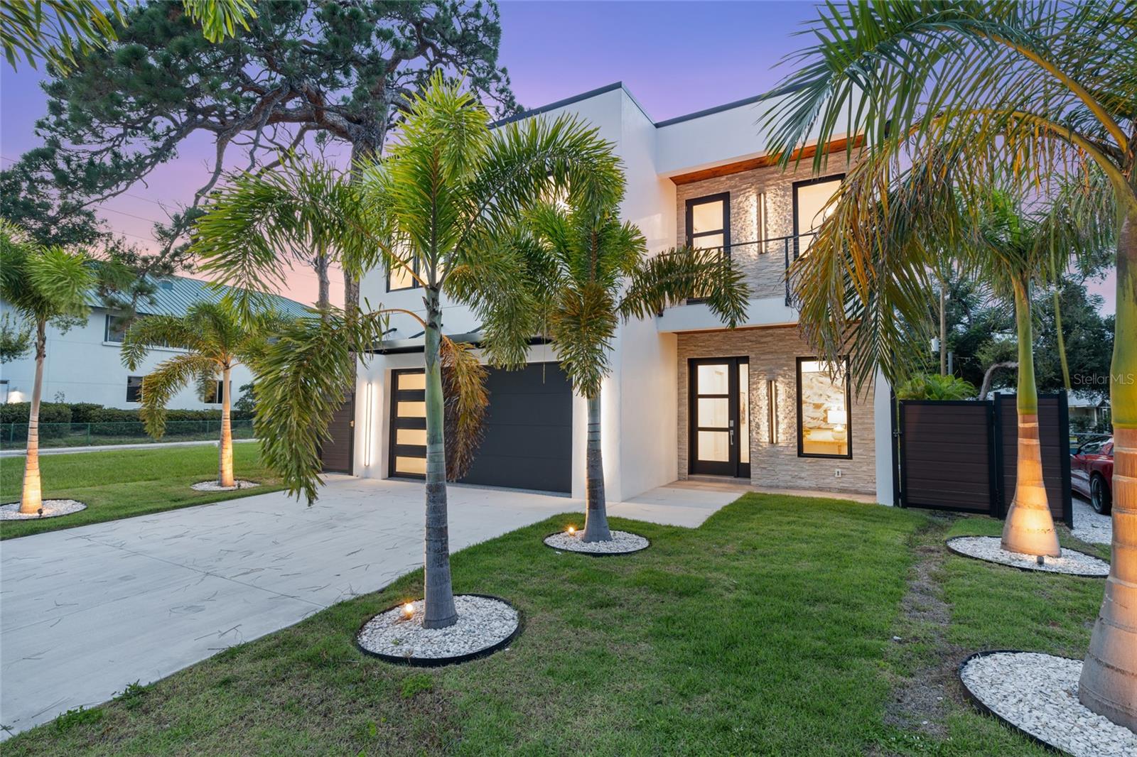 Virtually Staged. Move in Ready New Construction Contemporary Gem is now available with a fantastic location just minutes to Downtown Sarasota, Southside Village, the Barrier Islands and more!

Step into refined contemporary living with this brand-new, custom-built MAKO Home. Designed for both style and comfort, this exceptional residence features four generously sized bedrooms, each with a private en-suite bath and walk-in closet with built-ins, along with two powder baths for added convenience (one on each floor). The 3 guest rooms are located upstairs with the primary suite located on the first floor and thoughtfully designed with an expansive walk-in closet that includes built-in cabinetry and shelving, a soaking tub, walk-in shower and his and hers vanity! 

The open-concept layout flows effortlessly into a sleek, light-filled kitchen at the rear of the home. The beautifully designed kitchen is outfitted with two-tone solid wood cabinetry, SS Appliances (Cafe/GE), soft close drawers and doors, Quartz Countertops and an oversized centerpiece island with waterfall edge! Step outside through the hurricane impact sliders and enjoy a private, resort-style setting with views of the inviting saltwater heated pool/spa and fenced in lush backyard.

Upstairs, a flexible secondary living area/loft opens onto a spacious covered terrace—perfect for quiet mornings, evening gatherings, or simply soaking in the peaceful surroundings. Included in the upstairs living is a wet bar with storage and wine fridge. The home includes hurricane impact glass throughout with natural light pouring in, an epoxy finished 2-car garage and Dual laundry rooms, one on each level for added convenience.

Located just East of Tamiami Trail, this home puts you in the center of it all—walkable to medical facilities, minutes from Downtown Sarasota, and just a short drive to Siesta Key’s world-renowned beaches! A remarkable residence that is well-built for your use as a primary residence, vacation home or amazing investment opportunity as the City of Sarasota allows 7-Day rentals!

Every detail of this home was crafted with purpose—offering an unmatched combination of luxury, location, and livability. Reach out today to schedule a tour to see for yourself! **THIS PROPERTY QUALIFIES FOR A 1% LENDER INCENTIVE IF USING PREFERRED LENDER. INQUIRE FOR MORE DETAILS.**