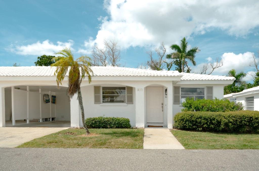 Virtually Staged. Priced to sell - Fully renovated villa ready for immediate occupancy! Welcome to Spanish Main Yacht Club, a sought-after 55+ waterfront community on Longboat Key, where coastal living meets exceptional value. This 2-bedroom, 2-bath villa-style condo offers 1700 SqFt of interior living space, 1087 of it under air, with endless potential to make it your dream home.

This stand-alone condo has undergone FEMA-approved storm mitigation and a full rebuild. Bring your vision and decorate to suit your personal style—below market value!

Step inside to find a spacious open-concept living and dining area, perfect for entertaining. The adjoining Florida room offers additional flexible space, bathed in natural light—ideal for morning coffee or quiet evenings.

The primary suite features an en-suite bathroom, closet and indoor laundry room.

Enjoy private beach access just steps away, or take advantage of the community marina with first-come, first-served boat slips, kayak racks, and direct access to Sarasota Bay. Amenities include a heated outdoor pool, shuffleboard courts, a clubhouse with game room, library, and frequent community events.

This pet-friendly community offers covered carport parking, guest spaces, and maintenance-free living, all set within beautifully maintained, palm-lined grounds. Just minutes from St. Armand’s Circle and Anna Maria Island, this location offers world-class shopping, dining, and entertainment, plus access to some of Florida’s finest white sand beaches.

Whether you're looking for an investment, full-time residence or a vacation getaway, this villa offers endless potential in one of Longboat Key’s most desirable communities. Seller says bring offers—don’t miss your chance to own a piece of paradise!