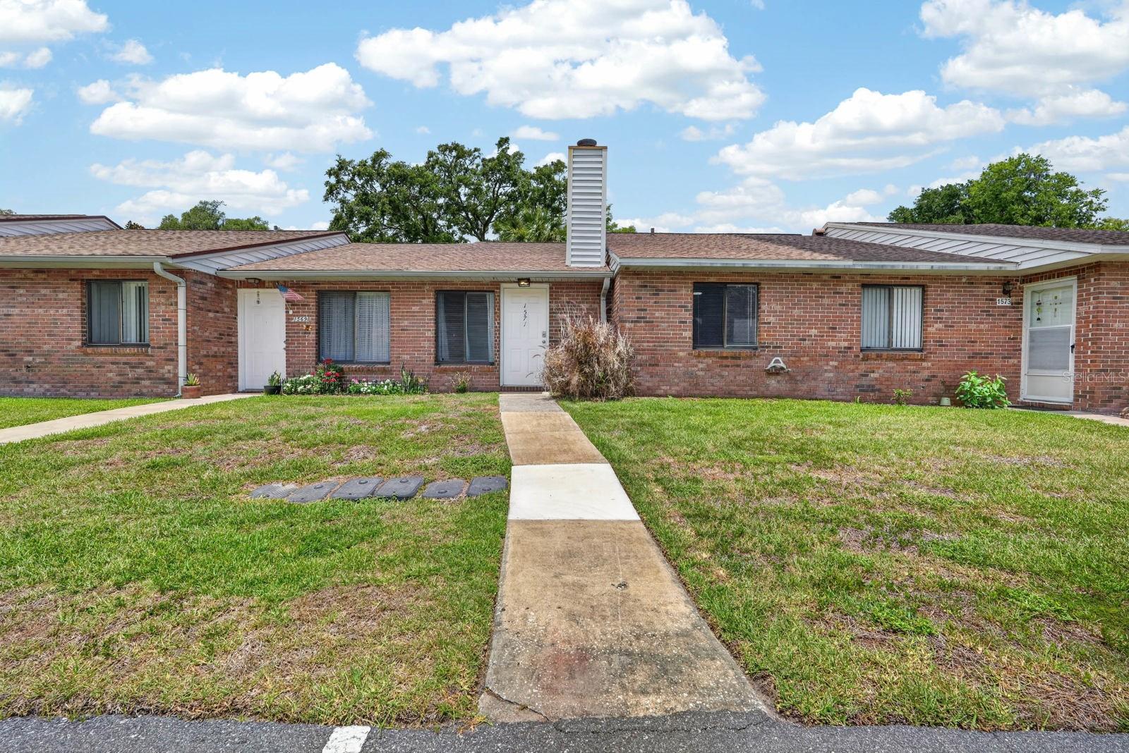 Welcome to 1571 Hancock Lane in Daytona Beach, a beautifully renovated home offering modern updates, stylish finishes, and low-maintenance living. Renovated in 2025, this move-in ready property features updated flooring, a fully remodeled kitchen with shaker cabinetry, butcher block countertops, stainless steel appliances, and a bright open-concept layout with soaring vaulted ceilings. The spacious living and dining areas flow seamlessly to the covered back patio and fully fenced backyard, perfect for relaxing or entertaining.

Additional highlights include updated bathrooms, modern fixtures, fresh interior finishes, and an exterior storage space for added convenience. Major system updates provide peace of mind with the roof, HVAC, and water heater all just 1 year old. Conveniently located close to shopping, restaurants, beaches, and major roadways, this home combines comfort, style, and location all in one package.

Seller concessions available for qualified buyers who use the preferred lender. Contact the listing agent for details. Don't miss your opportunity to own this updated Daytona Beach gem!