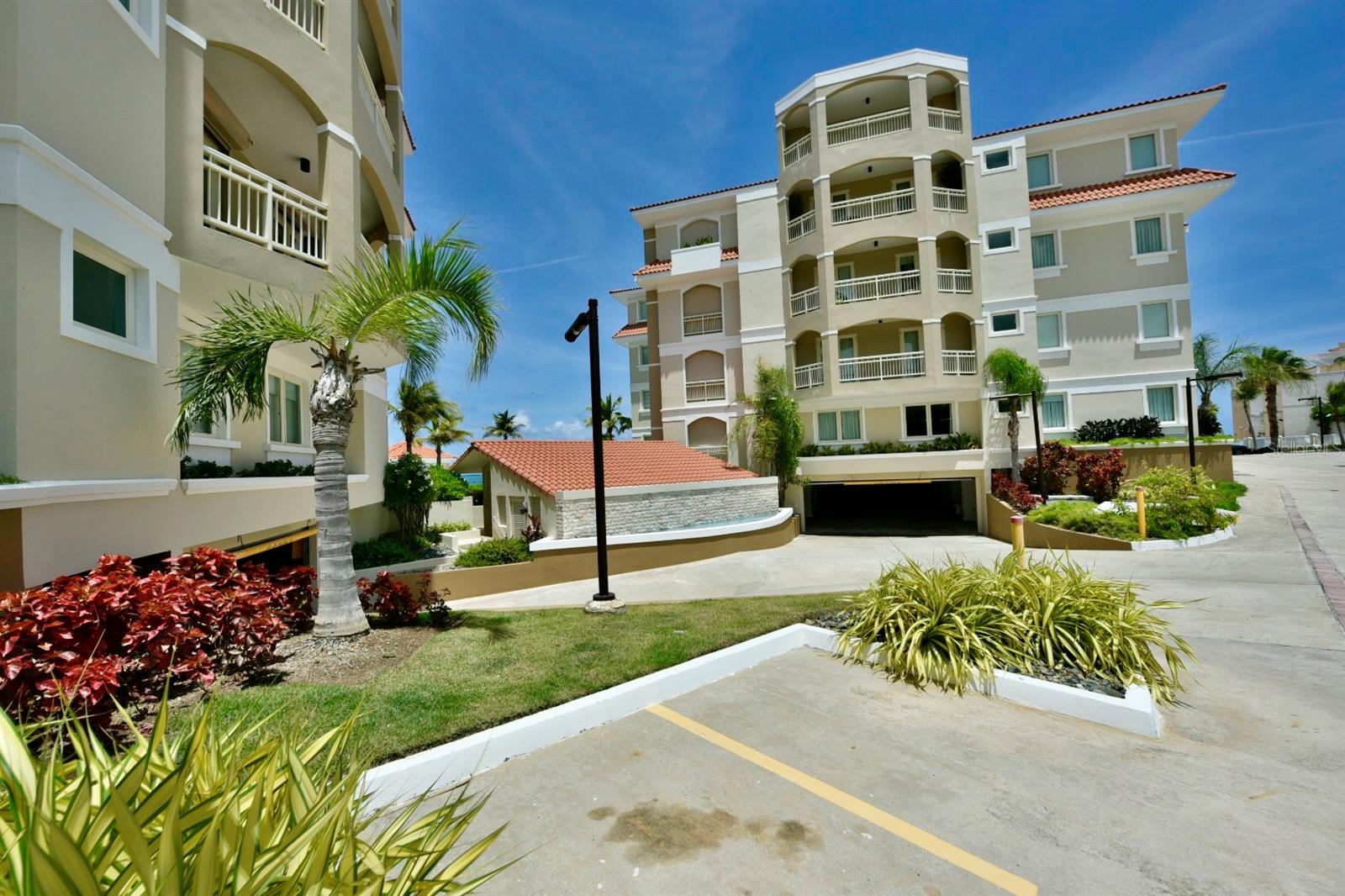 Plaza del Mar Condominium – Beachfront Four-Bedroom Residence

Located directly on the shoreline within Palmas del Mar, this four-bedroom residence captures uninterrupted ocean views and the natural light that defines Caribbean living. The open-concept design seamlessly connects the living, dining, and kitchen areas, creating a spacious central gathering area that extends toward an oversized balcony overlooking the water. Large openings invite in steady coastal breezes and frame the ever-changing blues of the sea, establishing a strong indoor-outdoor connection throughout the main living spaces.

The thoughtfully arranged floor plan provides comfortable bedroom accommodations with flexibility for guests, home office space, or additional living needs. The primary living areas are positioned to maximize the ocean backdrop, making the view a daily focal point rather than an occasional highlight.

Plaza del Mar is a beachfront condominium community offering a heated adult swimming pool, a separate ch¡ldren’s pool, fitness center, gazebo, landscaped lawn areas, two elevators, and full backup power supported by two generators. The residence includes two assigned parking spaces within the underground garage.

As part of Palmas del Mar, residents benefit from a master-planned, gated resort environment featuring golf courses, a marina, tennis facilities, dining venues, and extensive coastline.

Monthly HOA for Plaza del Mar is $597, and the annual Palmas del Mar master HOA fee is $1,300.
