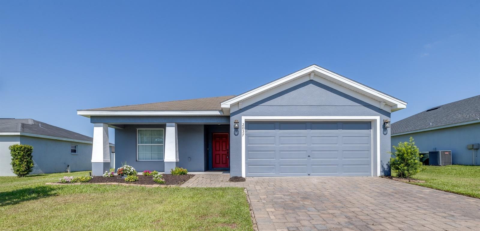 Take a look at this beautiful 4-bed 2-bath home for sale in the desirable Magnolia Walk community of Bartow. This spacious home, built in 2018, features a nice-sized lot and many nice interior upgrades. Inside you will find a well-designed open-concept layout with the large kitchen area overlooking the living room. The living room has plenty of space for family and guests and features beautiful tile flooring throughout. Overlooking the living area, the kitchen features really good-looking granite countertops, a large kitchen island with the same beautiful granite finish, stainless steel appliances, and nice vinyl flooring. Directly off of the kitchen, you have a dinette area that is perfect for family meals and also features nice vinyl flooring. On the other side of the kitchen, you have the pantry and a convenient inside laundry room that leads to the two-car garage. Near the front of the home, you have 2 of the secondary bedrooms and the secondary bathroom, with the primary bedroom and an additional bedroom being located at the rear of the home, which helps maximize privacy. All the secondary bedrooms feature beautiful flooring and plenty of space, with the secondary bathroom featuring a shower/tub combination and granite vanity. The nice-sized primary bedroom has a walk-in closet, beautiful flooring, and an en-suite bathroom that features a dual-sink vanity with a granite finish, a step-in shower, and a garden tub. Stepping outside, you have a porch space where you can grill out or entertain guests and a nice-sized backyard with plenty of space for pets. Magnolia Walk is a gated community in Bartow not too far from restaurants, shopping, and schools. Do not miss out on this beautiful home; schedule your showing today!