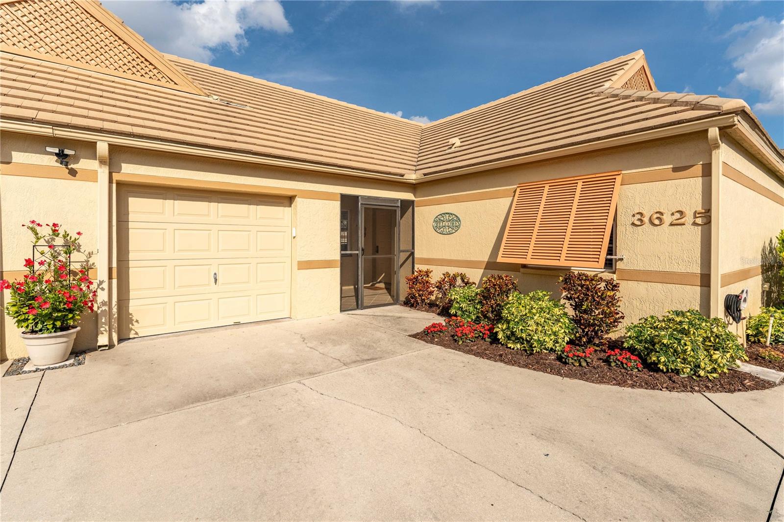PRICE REDUCTION! Stunning 3-Bedroom Condo in Gated Lakebridge Community – Bradenton, Florida Experience the best of Florida living in this beautifully maintained, move-in ready single-story condo in the sought-after Lakebridge Condominiums gated community, Bradenton, Florida. This maintenance-free home features 3 spacious bedrooms, 2 full bathrooms, an open floor plan, and a bright, airy lanai—perfect for relaxing or entertaining. Enjoy soaring vaulted ceilings in the great room, abundant natural light, and tasteful modern updates throughout. The primary suite offers a walk-in closet and a luxurious en suite bath. The updated kitchen is equipped with classic alabaster cabinetry, island with seating, and a full-size washer and dryer in the convenient laundry area. Additional highlights include a 12’ x 20’ garage with painted floors and walls, a private, landscaped backyard, and a tile roof replaced in 2021—covered by the homeowner’s association (HOA) for peace of mind. Pets are welcome with size restrictions. Resort-style amenities include a clubhouse, two swimming pools, tennis courts, and lush landscaping. The location is unbeatable—minutes from IMG Academy, State College of Florida, Anna Maria Island beaches, SRQ Airport, shopping, dining, golf courses, hospitals, medical centers, parks, and walking trails. This is the perfect opportunity for buyers seeking a Florida condo with garage, pool, tennis courts, and proximity to beaches, schools, airport, golf, and shopping. Don’t miss your chance to own a piece of Bradenton real estate—schedule your showing today and start living the Lakebridge life!