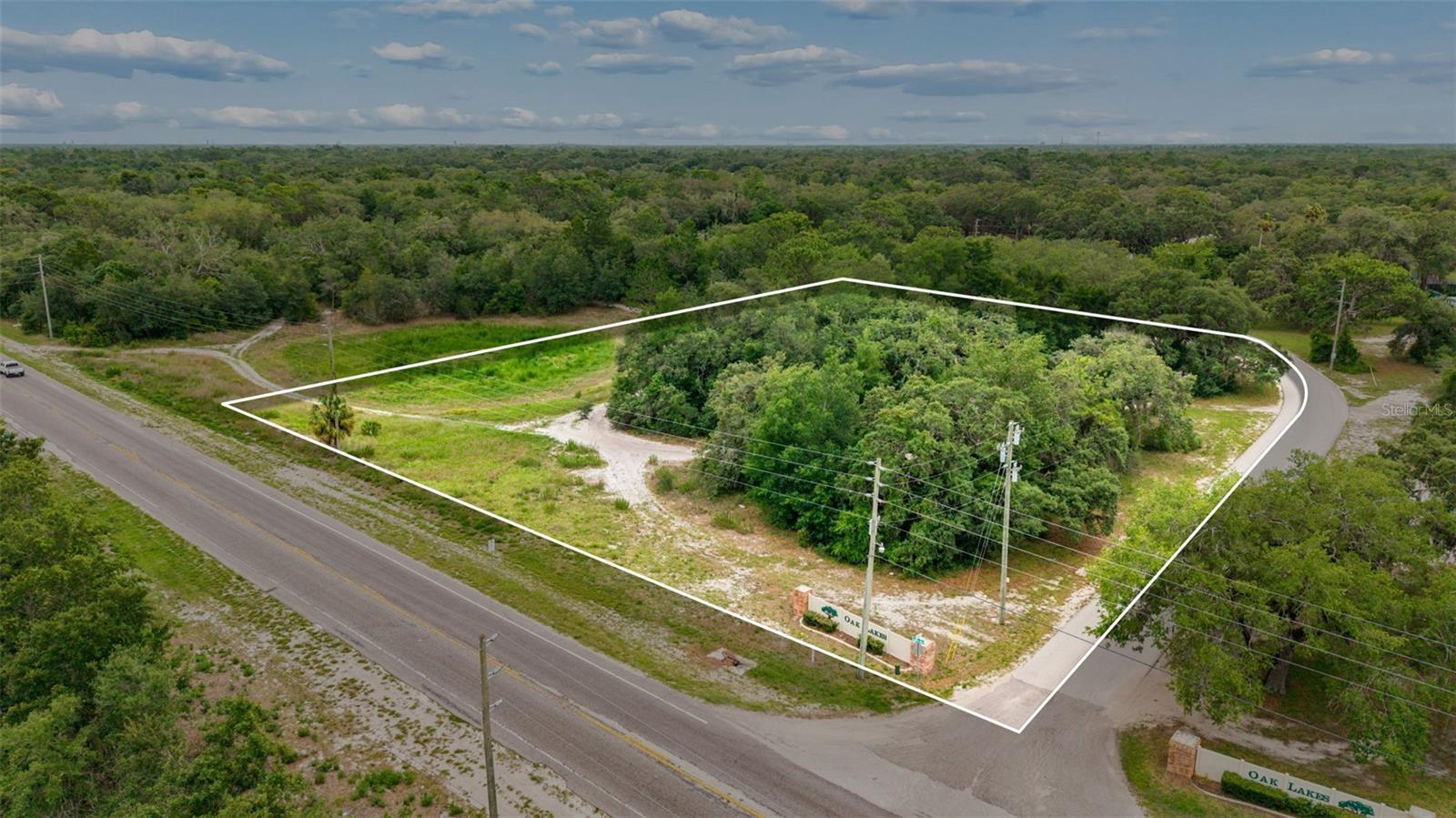 Exceptional opportunity to own 2.84 acres of vacant commercially zoned (OP – Office Professional) land on highly traveled County Line Road in Spring Hill. Positioned in a rapidly expanding area with strong residential and commercial growth, this prime parcel offers outstanding visibility and accessibility for a variety of professional office and business uses. Whether you're looking to develop a medical office, professional services building, corporate headquarters, or investment property, this site provides the flexibility and location to bring your vision to life. Conveniently located near major roadways, shopping, healthcare facilities, and established neighborhoods, this is a rare chance to invest in one of the area's most desirable growth corridors!