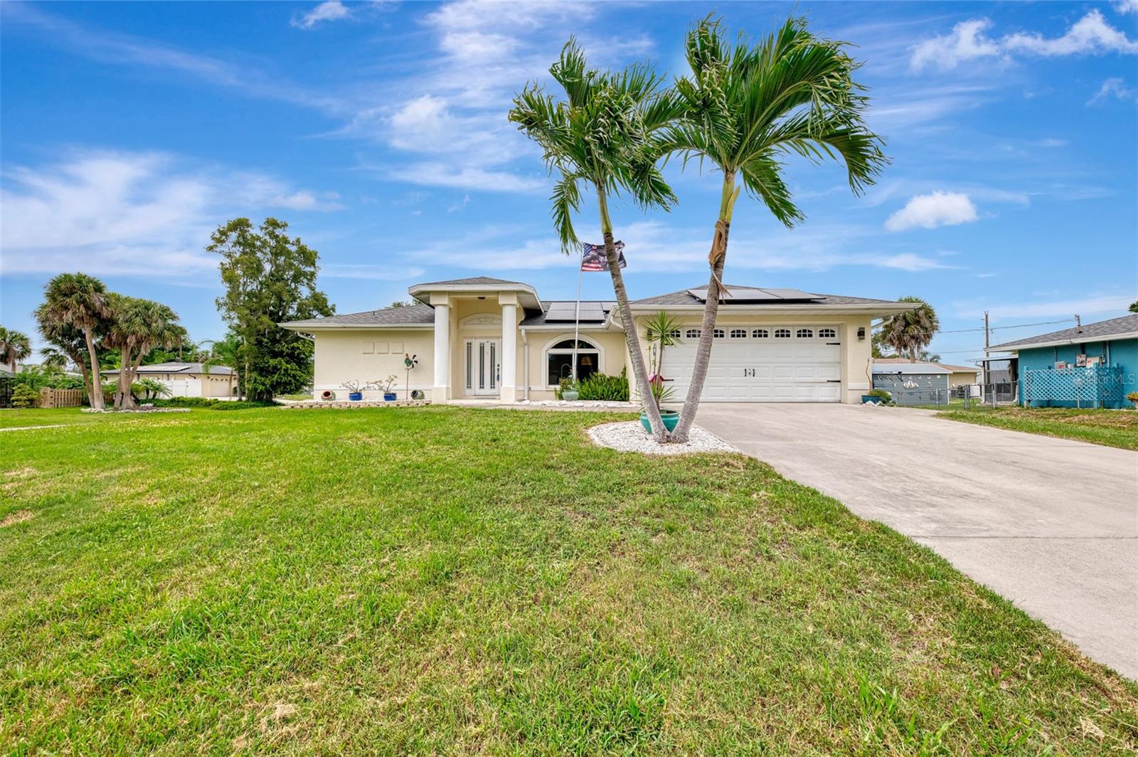 This Venice High School, move-in ready, South Venice home has space for everyone. In addition to the living room, there is a family room with impact sliding doors leading to the Florida room which overlooks the nice sized backyard.  The Florida room has a wall air conditioner unit to keep it cool in the summer time and impact windows for a great cross breeze on days you want to open them. In addition to the extra living spaces, this home has a split floor plan with three spacious bedrooms, 2 baths and so much more. The living room has a vaulted/trey ceiling. There is crown molding throughout the home except in the Florida room and bathrooms. The laundry room, conveniently located off of the garage, also has a laundry sink and cupboards. The back yard is great for yard games, throwing a baseball, or anything else you want to do outside. There have been many additional upgrades as well. The expensive stuff has been done for you! Roof is 2 years old, owned solar panels, Hybrid water heater, and air conditioning all new in 2020. All windows, including those in the Florida room, and both sliding doors are impact rated and were installed in 2021. Stainless steel kitchen appliances are new in 2024. In this house, you will not only have an updated, move in ready home but you can feel good about all of the other expenses items that are completed. You just move in and enjoy Florida life.