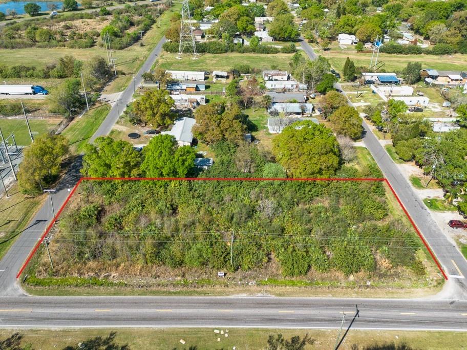 Prime Commercial Corner with Exceptional Visibility and Access! This 0.72-acre vacant parcel offers a rare opportunity in a high-exposure location with excellent visibility along a busy, high-traffic roadway. Zoned CN (Commercial Neighborhood), the property is well-positioned for a variety of commercial uses and development possibilities. One of its most valuable features is access from three different streets, providing outstanding flexibility for site design, traffic flow, and customer convenience—an ideal setup for businesses that benefit from easy entry and exit points. The CN zoning allows for a wide range of potential uses, making this property a strong candidate for general retail, a banking branch, a convenience store, a laundromat, a vehicle repair facility, a quick-service restaurant, professional office space, personal service businesses, or a medical clinic. With nearly three-quarters of an acre to work with, high daily traffic counts, and strong visibility, this parcel presents an excellent opportunity for investors, developers, or business owners looking to establish a presence in a growing commercial corridor. A highly accessible site with strong development potential—ready for your vision.