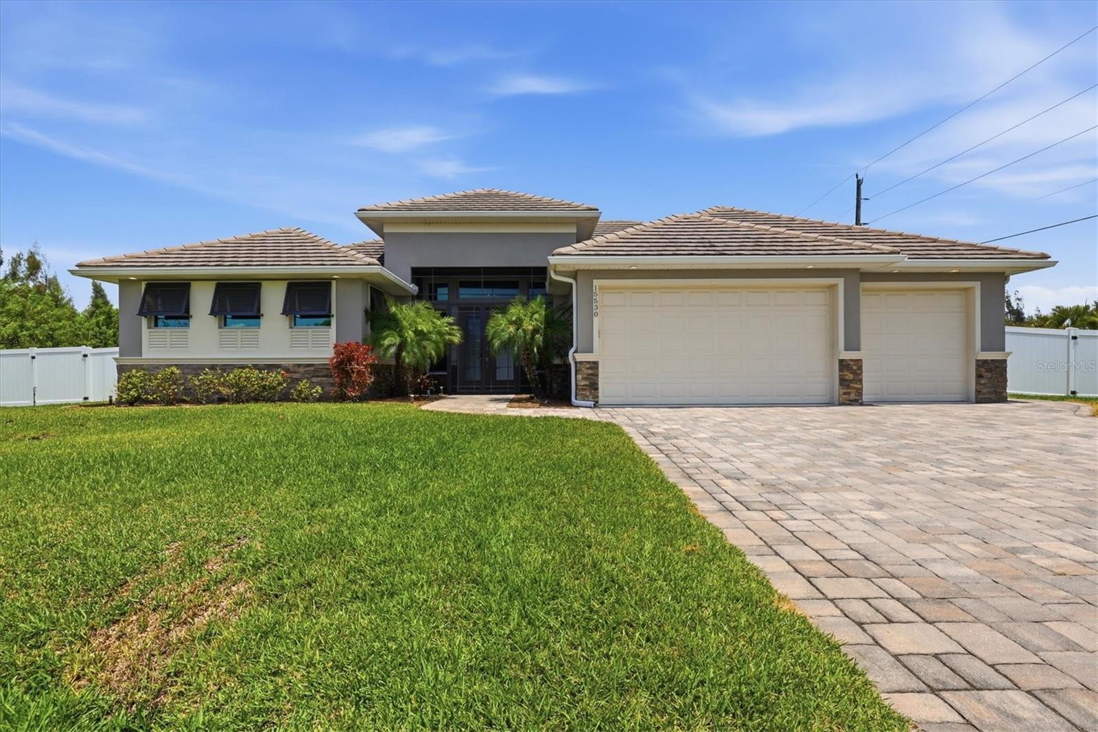 Stunning 3BR/2BA Pool Home on Staunton Waterway — 3-Car Garage, 10,000-lb Boat Lift, One-Bridge to Gulf


Experience waterfront Florida living in this custom-built 3-bedroom, 2-bath pool home on the Staunton Waterway in desirable South Gulf Cove. Meticulously maintained and designed for comfort and entertaining, the home features soaring high ceilings and 0-degree sliding glass doors that open seamlessly to an expansive screened lanai and resort-style outdoor living area with a summer kitchen, sparkling pool, sunshades and lush tropical landscaping. Boaters will appreciate the private dock, 10,000-pound boat lift and one-bridge access to open water with quick rides to the Interceptor Lagoon and Gulf waters. The gourmet kitchen showcases Café GE appliances, wine refrigerator, granite countertops, soft-close cabinetry, double dishwasher and ceramic tile laid on the diagonal throughout. The split floor plan provides privacy, and the spacious primary suite offers high ceilings and a spa-inspired custom shower with double vanities. Recent updates provide peace of mind, including newer A/C (2024), pool heater (2022), lanai screen (2022), irrigation pump (2025), fencing (2022), whole-house generator outlet and whole-house water treatment. The 3-car garage features durable epoxy flooring. Additional touches include plantation shutters inside and out, custom blinds and window tinting. Close to beaches, shopping, dining, fishing, golf and other outdoor activities.

Short Social/Ad Blurb
Custom 3BR/2BA waterfront pool home on the Staunton Waterway with private dock and 10,000-lb lift, one-bridge access to the Gulf, oversized screened lanai with summer kitchen, gourmet kitchen with Café appliances, 3-car garage and recent A/C (2024) and pool heater (2022). DM for details or to schedule a showing.