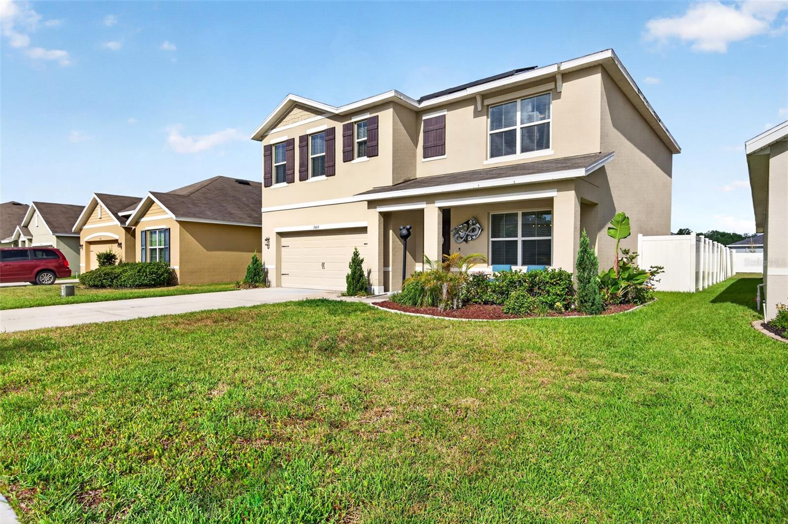 Welcome to this beautifully maintained 5-bedroom, 3-bathroom home with a versatile den and 2,575 square feet of thoughtfully designed living space in the desirable Silverado Ranch community. Built in 2020, this spacious home features an open-concept floor plan with a large kitchen overlooking the dining and family room, complete with a center island, granite countertops, stainless steel appliances, and ample cabinet space perfect for entertaining and everyday living. The versatile flex room the perfect space for a home office, playroom or study to fit your lifestyle. The flexible layout also includes a first-floor bedroom and full bath, ideal for guests or multigenerational living, while the second floor offers a generous loft, a spacious primary suite with a walk-in closet and ensuite bath, and three additional bedrooms. Enjoy the fully fenced backyard with plenty of room for outdoor gatherings, pets, or play. The home also features solar panels that will be paid off by the seller at closing, allowing the new owner to enjoy energy savings without assuming a solar loan. Conveniently located near shopping, dining, schools, parks, and major highways with easy access to Tampa, Wesley Chapel, and Lakeland. Don't miss the opportunity to make this move-in-ready home yours—schedule your private showing today!