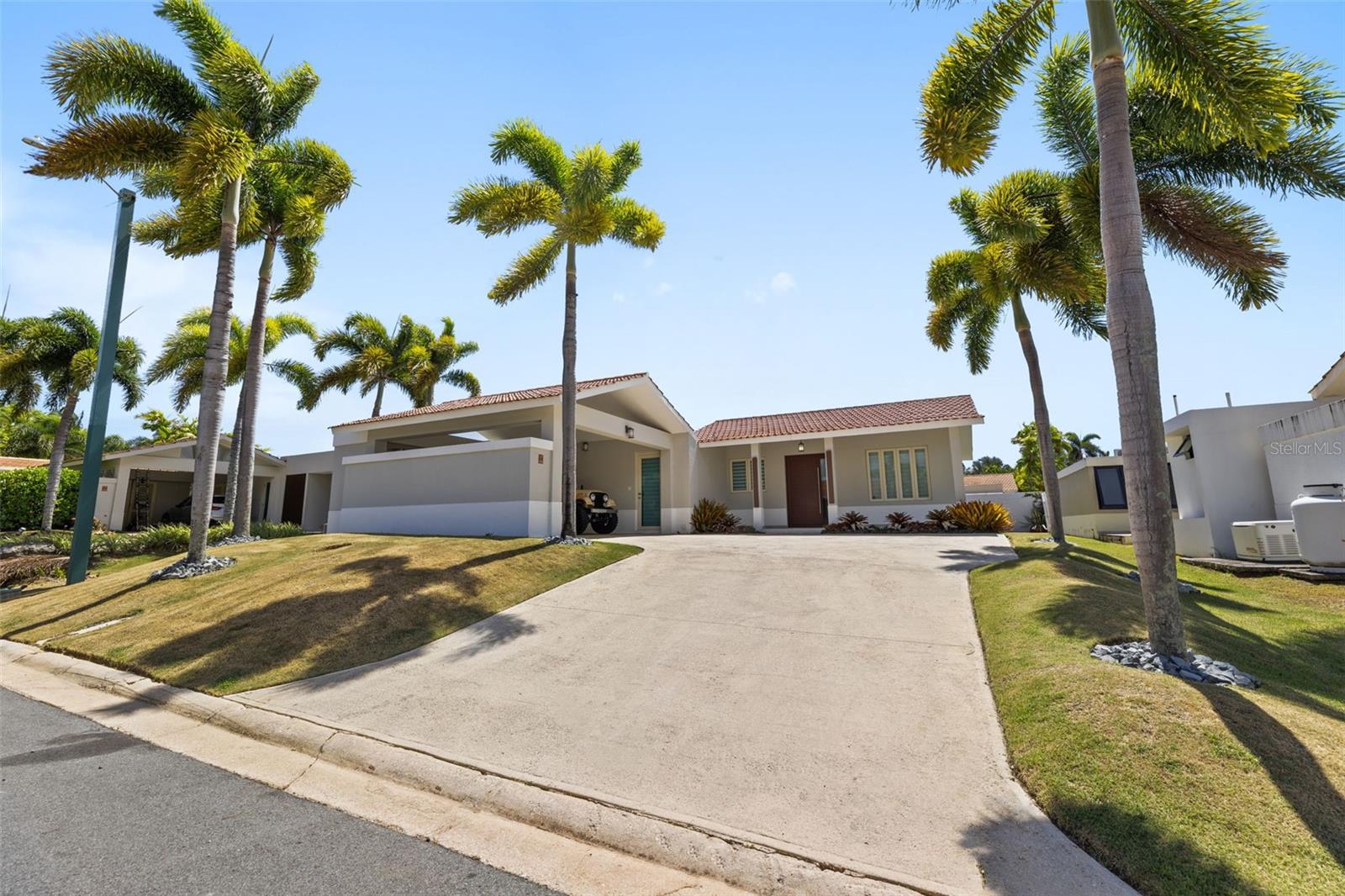 Located in the highly sought-after community of Sabanera Dorado, this beautifully expanded Villa Carbia provides additional living space and enhanced functionality beyond the standard floor plan. Featuring 3 bedrooms, 3 full bathrooms, 1 half bath, and a versatile flex room that can be used as an office, playroom, gym, or guest space, this home provides exceptional comfort and functionality. Ideally situated just a short distance from the school, the property enjoys one of the community’s most convenient locations. The expanded layout offers more interior living space than a standard Villa Carbia, creating a bright and spacious atmosphere throughout. Outside, you’ll find a generous backyard and an outdoor barbecue area. This move-in-ready home combines convenience, space, and an unbeatable location within one of Dorado’s most desirable gated communities.