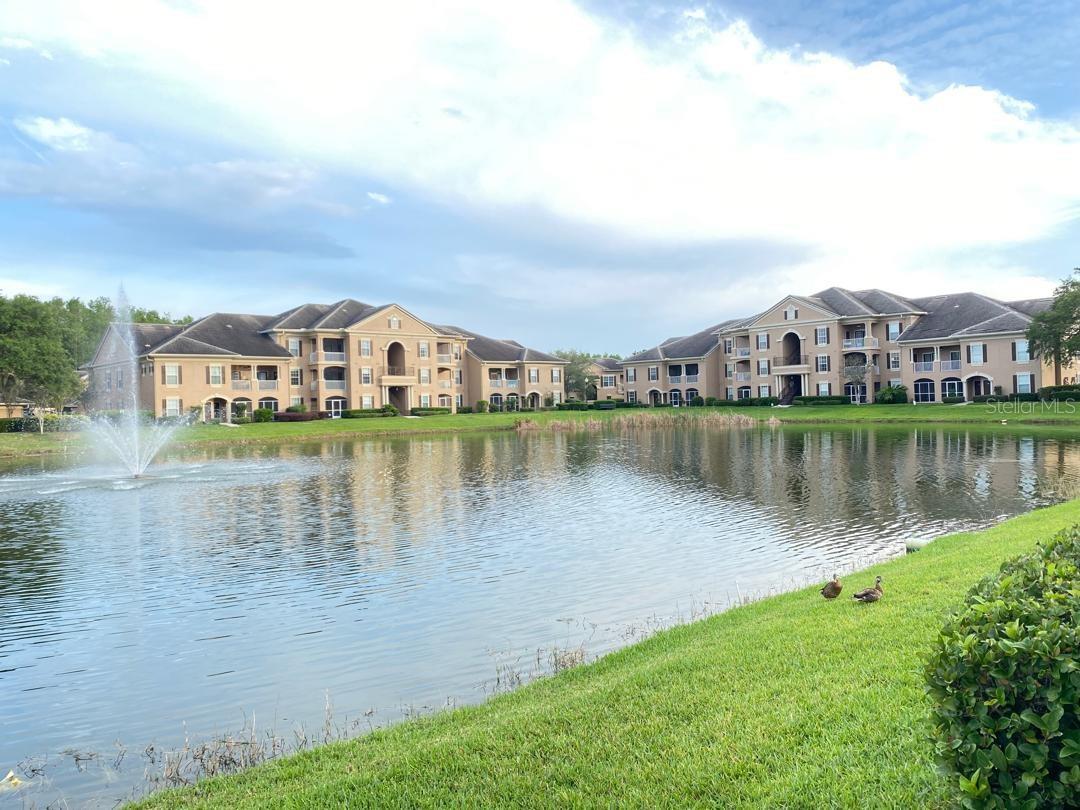 Welcome Home to Capri at Hunter's Creek – One of Orlando's Most Desirable Gated Communities! Discover the perfect blend of comfort, style, and convenience in this beautifully maintained apartment featuring a bright and spacious open-concept floor plan designed for modern living. The upgraded kitchen showcases elegant granite countertops, ample cabinet space, and a functional layout that flows seamlessly into the generous living and dining areas, creating the perfect setting for entertaining or simply relaxing at home. Step outside to your private patio and enjoy the peaceful surroundings, or indulge in the resort-style amenities including a sparkling swimming pool, fully equipped fitness center, elegant clubhouse, and sand volleyball courts. Ideally located in the award-winning Hunter's Creek community, this home is just minutes from top-rated schools, The Loop, world-class shopping, restaurants, Orlando International Airport, major highways including SR-417, Florida's Turnpike and I-4, as well as Walt Disney World, Universal Orlando, and other renowned Central Florida attractions. Whether you're a first-time homebuyer, downsizing, or searching for an excellent investment opportunity, this exceptional property offers the perfect combination of location, lifestyle, and value. Don't miss your chance to own a home in one of Orlando's most sought-after communities!