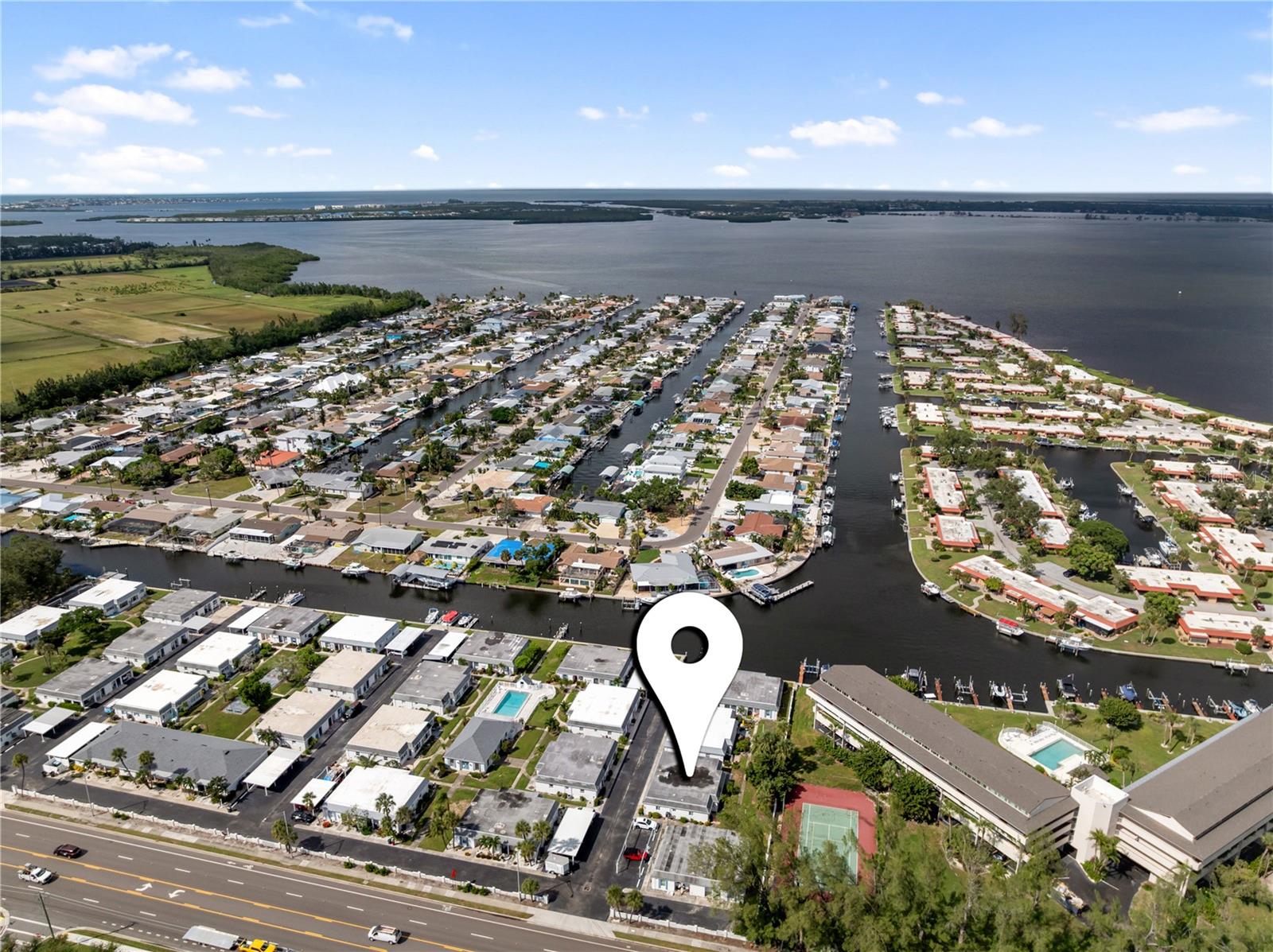 **LOWEST PRICED UNIT IN COMMUNITY - SELLERS OFFERING TO PAY FOR CONDO FEES THROUGH THE REST OF THE YEAR!**

Welcome to Casco Dorado, a highly desirable 55+ waterfront community in Bradenton, Florida, offering saltwater canal access just minutes from Anna Maria Island, Gulf beaches, waterfront dining, and shopping. This fully renovated 2-bedroom, 2-bath condo combines coastal living, boating access, and modern upgrades at an affordable price point rarely found near the beach.

This move-in-ready Bradenton condo features approximately 1,134 square feet of beautifully updated living space, including an enclosed Florida room perfect for relaxing or entertaining. Inside, you’ll find a completely remodeled 2025 kitchen with soft-close cabinetry, updated countertops, designer backsplash, new sink, stainless steel appliances, and a stackable washer and dryer.

Luxury vinyl plank flooring flows throughout the living area and primary bedroom, complemented by fresh interior paint, updated drywall and trim, modern interior doors, stylish bathroom vanities, and smooth ceilings with popcorn texture removed for a clean, contemporary look.

Major recent upgrades provide added value and peace of mind, including:

New AC (2024)
New water heater (2025)
Hurricane-impact windows and doors
Added attic insulation for energy efficiency

Casco Dorado is one of Bradenton’s hidden gems for active adults seeking a low-maintenance Florida lifestyle near the water. Residents enjoy a heated community pool, clubhouse, shuffleboard courts, and saltwater canal access ideal for kayaking, paddleboarding, or small watercraft.

The monthly condo fee of $980 includes flood insurance, cable, internet, water, exterior maintenance, and community amenities — making this an excellent lock-and-leave seasonal home, vacation getaway, or full-time Florida residence with predictable expenses.

Located just a short drive from Anna Maria Island, Holmes Beach, and Bradenton Beach, this updated waterfront condo offers the perfect blend of affordability, convenience, and coastal charm.

If you’ve been searching for a renovated condo in Bradenton near Anna Maria Island with boating access, hurricane upgrades, and resort-style amenities, this exceptional 55+ waterfront condo is a must-see.