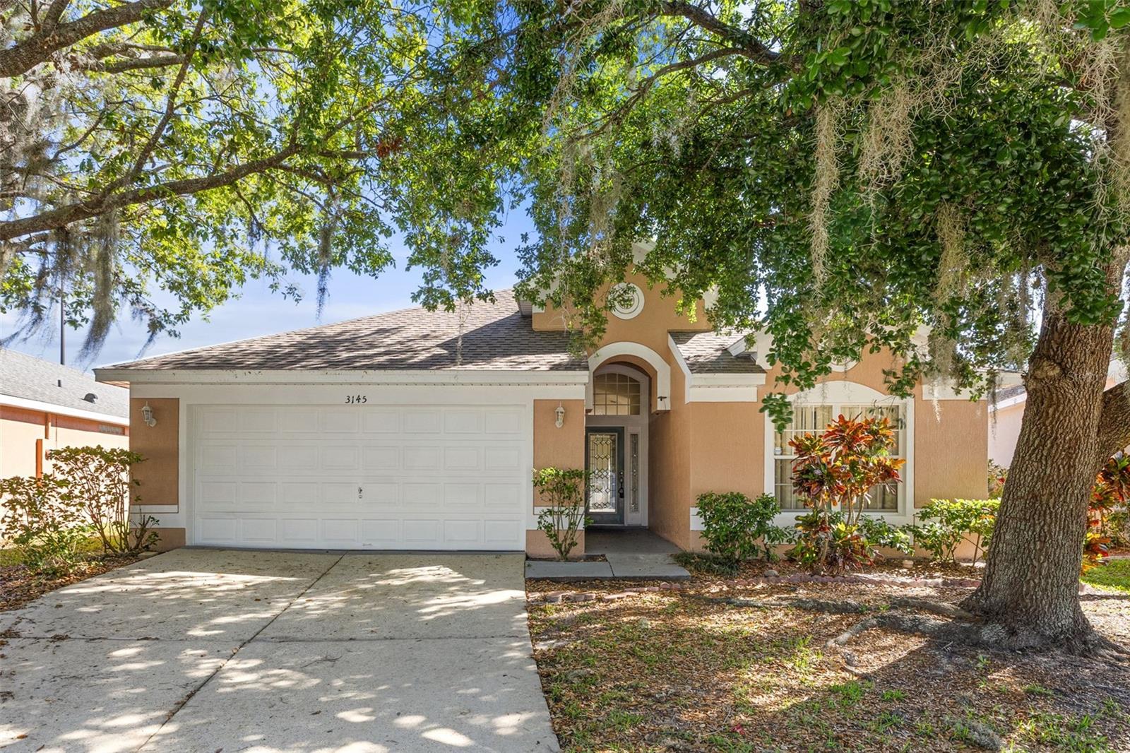 One or more photo(s) has been virtually staged. One or more photo(s) has been virtually staged. Welcome to this charming 3-bedroom, 2-bathroom home located in a highly sought-after neighborhood! Freshly updated with new exterior paint and the roof was replaced in 2023. Inside, you'll find beautiful tile flooring throughout, providing a sleek, low-maintenance aesthetic. The spacious layout features a bright and airy living area, perfect for both relaxation and entertaining. Enjoy the added privacy of no rear neighbors, creating a serene backyard space to unwind and enjoy the outdoors. With proximity to Disney, Universal, Sea World, shopping, schools, and local amenities, this home is ideally situated for convenience and ease of living.