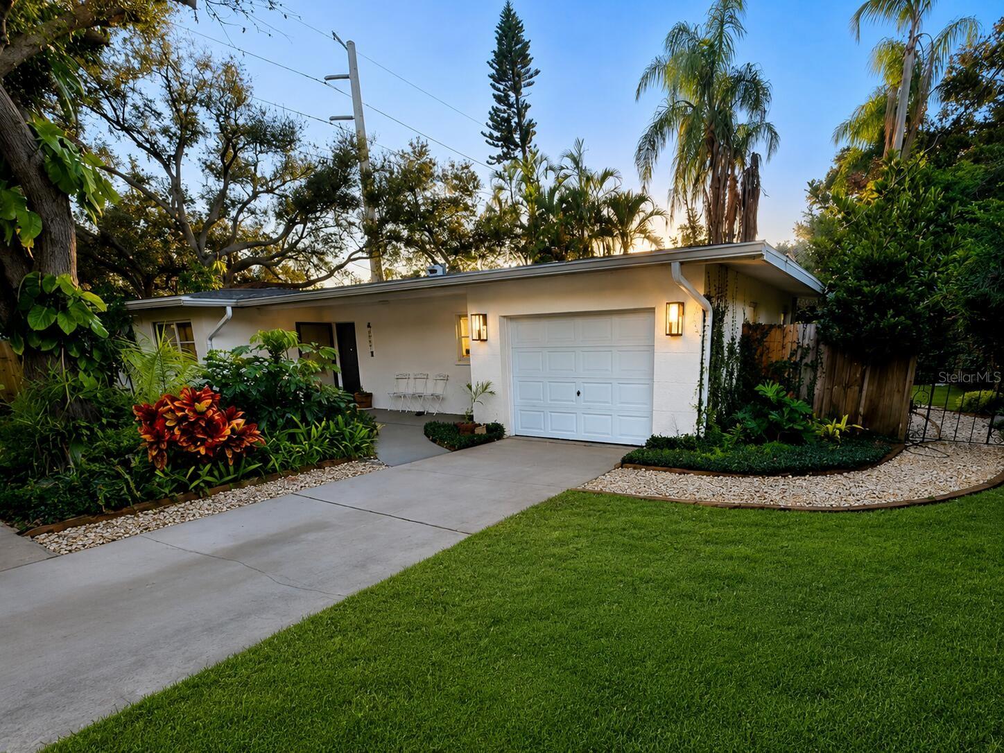 Discover this charming fully furnished block home,  turn key 3 bedroom/2 bath home located in Sarasota. 10-15 minutes to Siesta Key Beach, close to shopping, city and entertainment.  This home is surrounded by beautiful mature gardens and has a spacious layout with abundant natural light.  Inside you'll find a modern kitchen with updated appliances, inviting living spaces, a garage with laundry and sauna and a private backyard great for relaxation in a screened in lanai garden room. The home is being sold with high end furnishings, home decor, linens, dishes, etc.  The neighborhood is safe and is walking distance to a highly desired A rated school. Don't miss the opportunity to explore this delightful home and come see it for yourself.